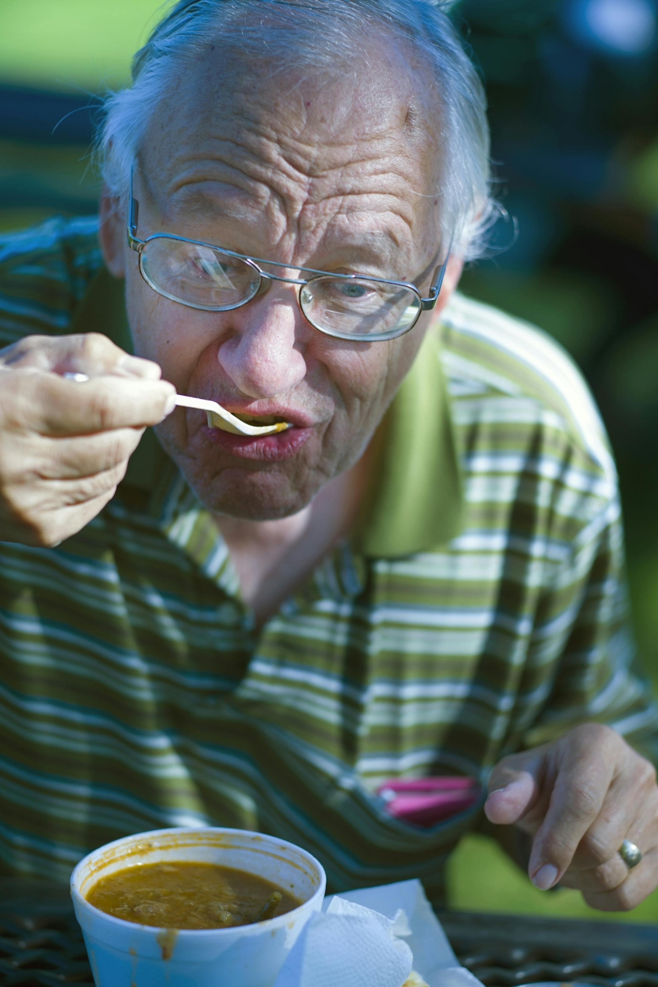 At Casey Lake Park in North St. Paul where the fire department held its annual booya fundraiser, Bob Pechmann could not wait to taste the stew he has known since he was a small child. Even brain surgeries to remove tumors in his brain did not remove the 70 years of eating of booya.