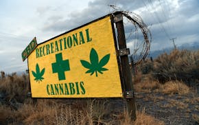 A sign advertises cannabis for sale near Moffat, Colo. Denver is the most weed-friendly vacation spot in the United States, according to travel tips w