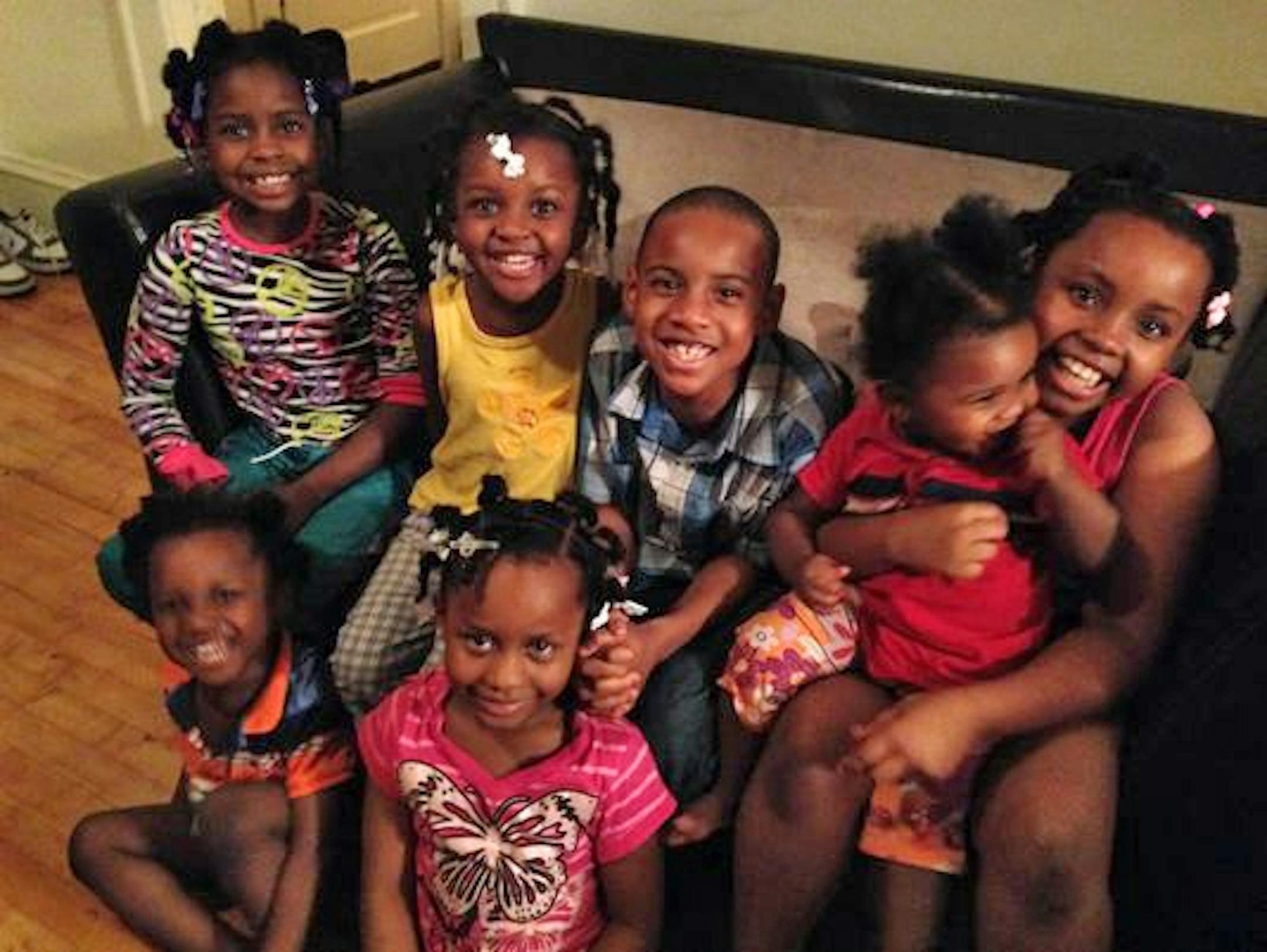 The Lewis family children. In front: Troy, left, and Electra. In back from left: Mary, Fannie, Christopher, Gwendolyn and Shaca. Only Electra and Shaca among the Lewis children survived the fire.