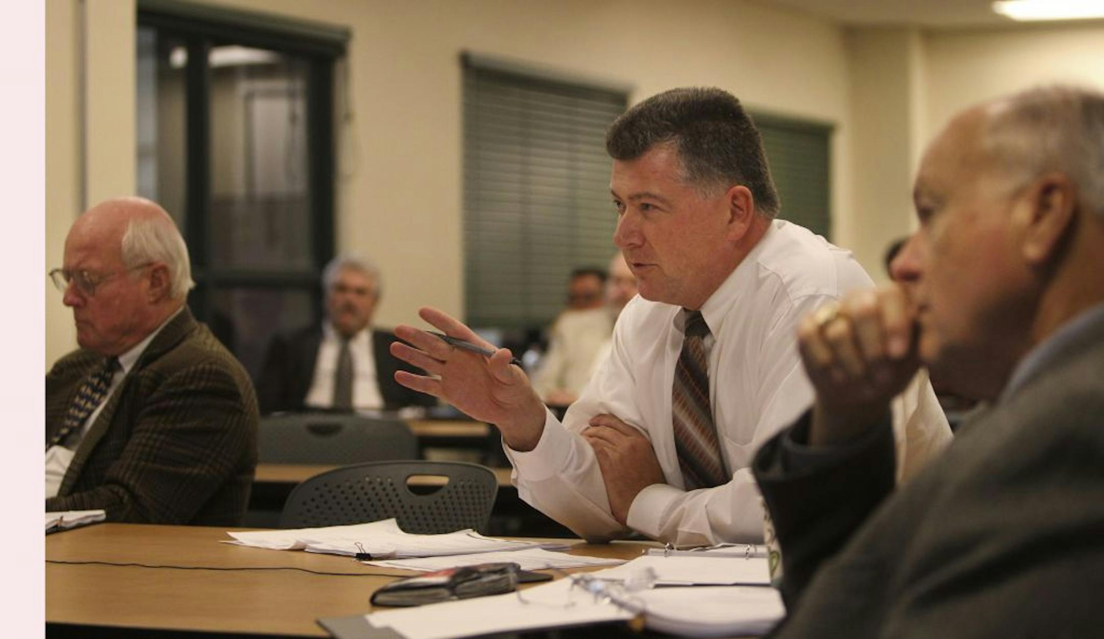 Mark Ethen, center, chairman of the Minnesota Racing Commission's finance committee, asked a question about electronic blackjack on Thursday.