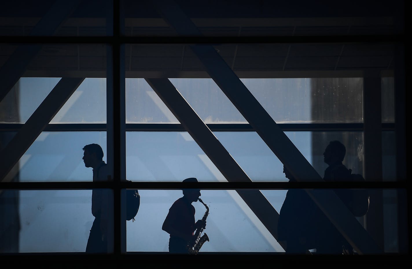 Richard Fairbanks, of Minneapolis, played the saxophone for passersby in the skyway over Fourth Avenue connected to the Hennepin County Government Center Friday afternoon. Fairbanks says he plays in that specific skyway every Friday during the colder months of the year and spends the rest of the time playing on the Stone Arch Bridge. "I like this spot because I like to play for couples who get married by a justice of the peace (at the government center)," said Fairbanks. "It's very touching to m