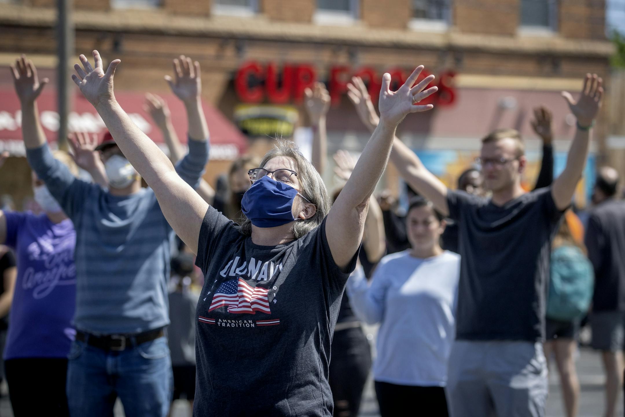 Many who showed up to pay their respect and see the George Floyd memorial joined an outside church service at Worldwide Outreach for Christ Church on the corner of Chicago and 38th Street, Sunday, May 31, 2020 in Minneapolis, MN.