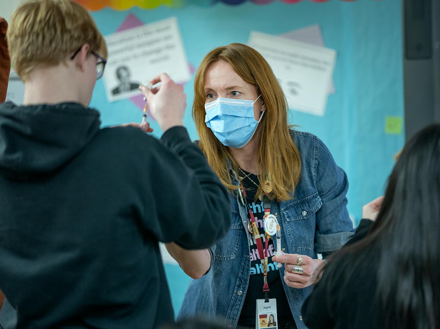 M Health Fairview's Dir. of community clinical care Ingrid Johansen demonstrates how to administer an injectable naloxone to a group of students at Washington Technology Magnet School in St. Paul, Minn., on Thursday, Jan. 11, 2024. ] Elizabeth Flores • liz.flores@startribune.com