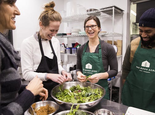 Dr. Kate Shafto and students Gretchen Klefstad, McKenna Campbell-Potter and Leo Howard prepared greens in a Food Matters for Health Professionals class held at the Good Acre's kitchen in Falcon Heights.