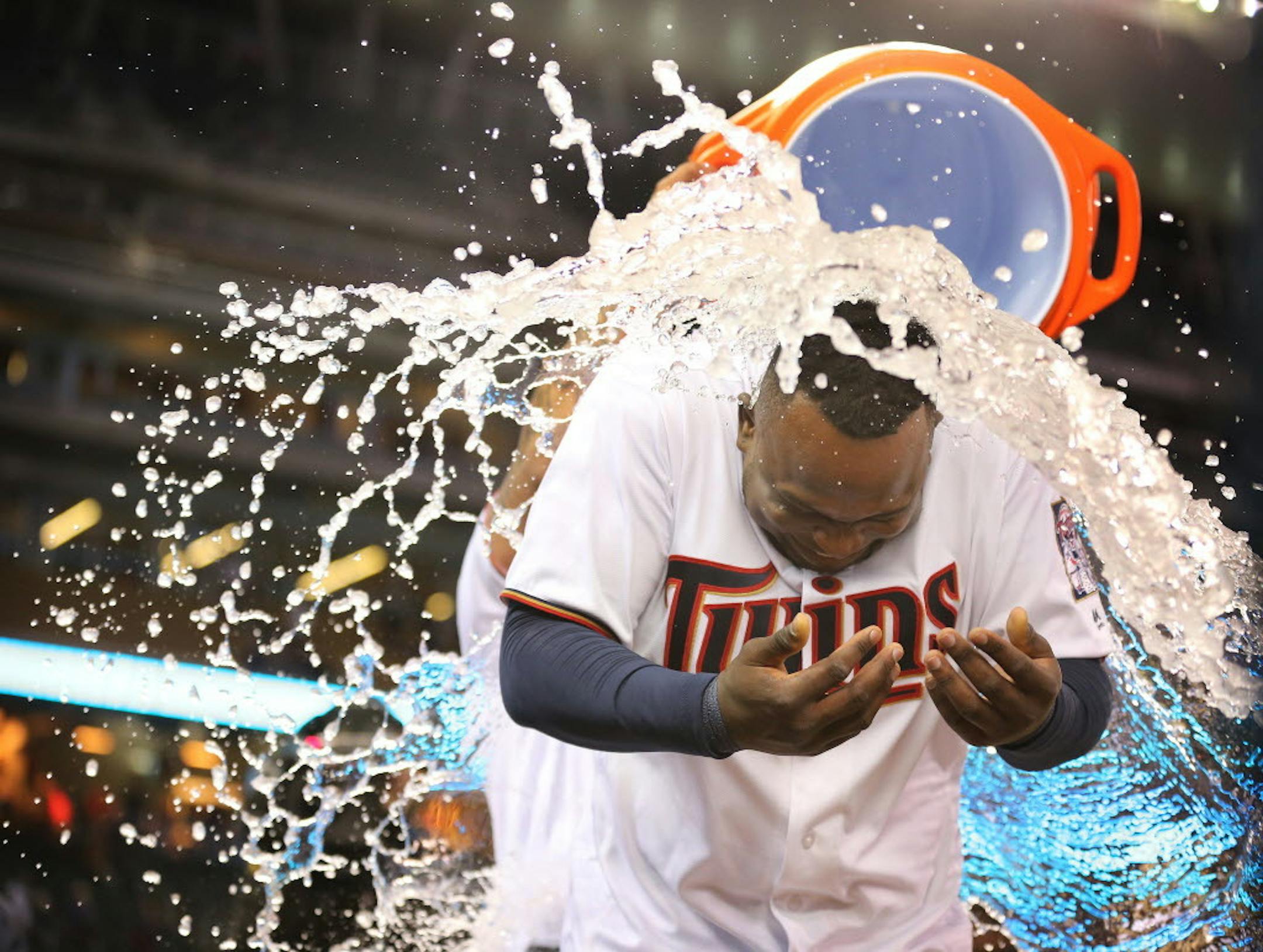 Miguel Sano got the Gatorade-bucket shower after he hit the game-winning single in the ninth inning scoring Brian Dozier at Target Field Tuesday, April 25, 2016 Minneapolis