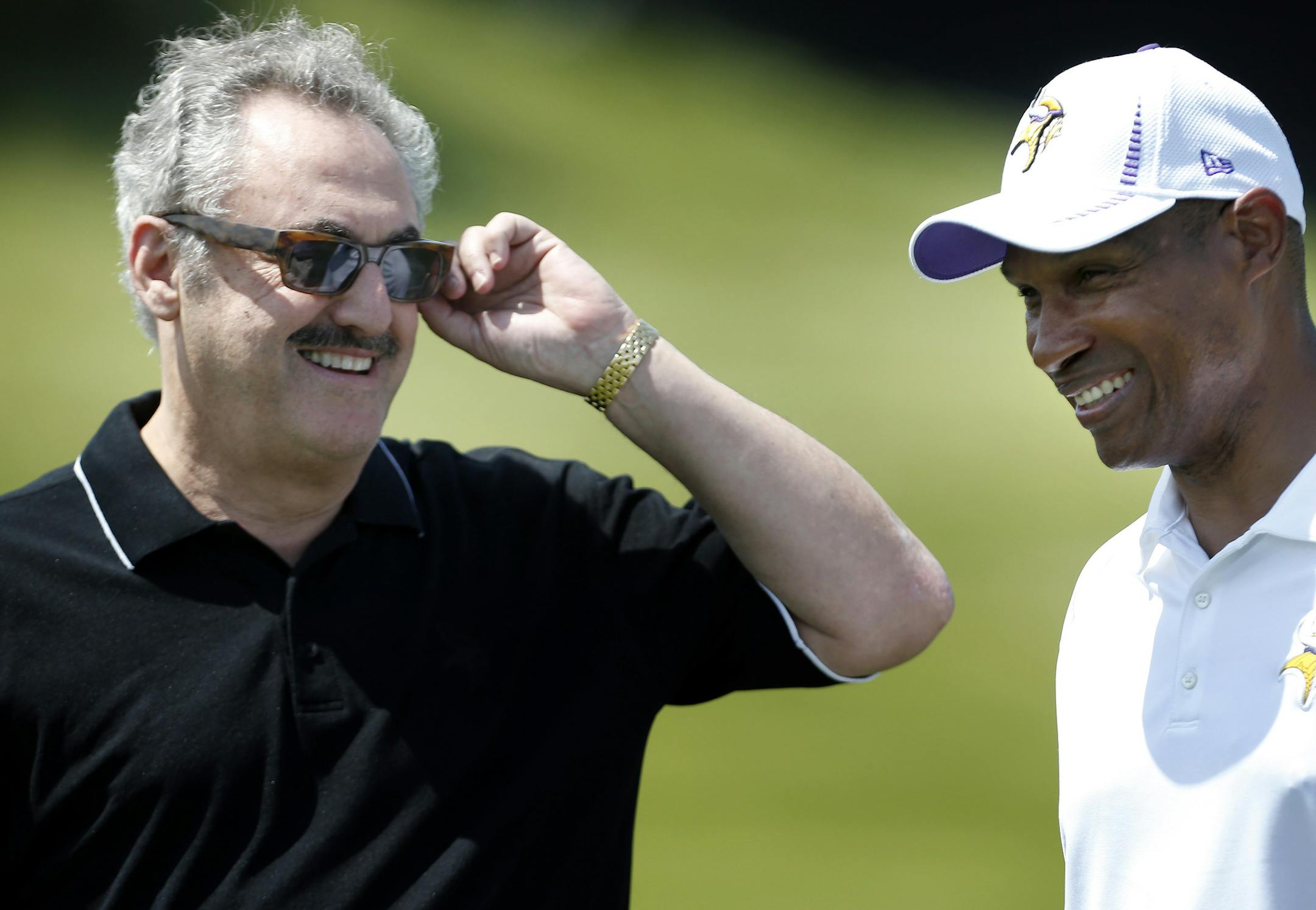Minnesota Vikings owner Zygi Wilf and head coach Leslie Frazier spoke during practice on Wednesday. ] CARLOS GONZALEZ cgonzalez@startribune.com June 19, 2013, Eden Prairie, Minn., Winter Park, Minnesota Vikings minicamp