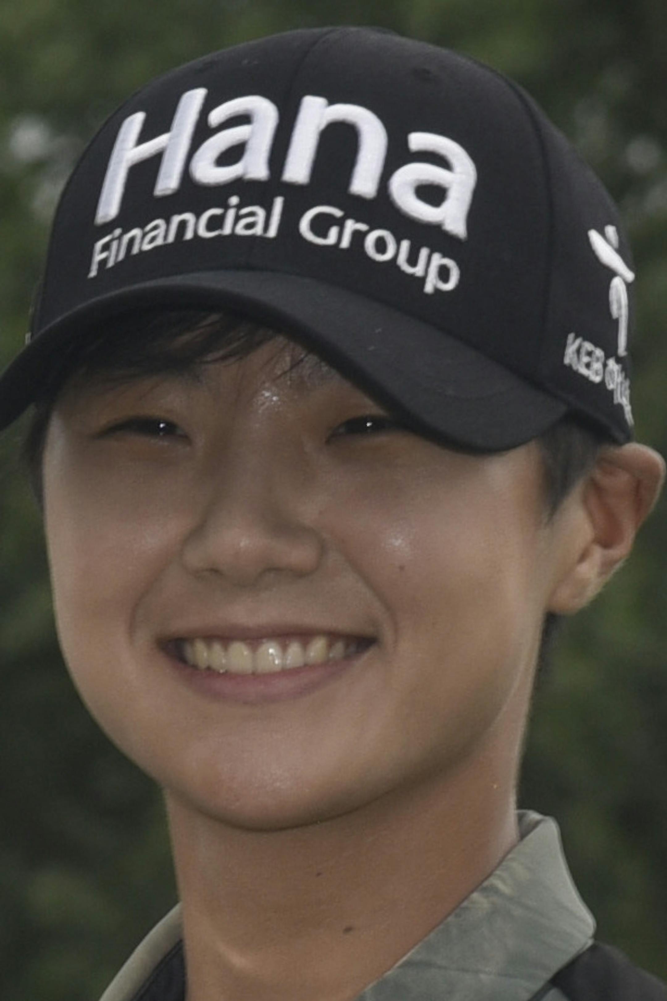 Sung Hyun Park, of South Korea, posses with the championship trophy after making a birdie on the second hole of a playoff on the 16th hole to win the KPMG Women's PGA Championship golf tournament at Kemper Lakes Golf Club in Kildeer, Ill., Sunday, July 1, 2018. (AP Photo/David Banks)