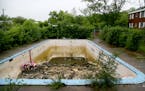 Monday where firefighters pulled two brothers from this abandoned swimming pool and seen Tuesday, May 26, 2015, in St. Paul, MN.](DAVID JOLES/STARTRIB