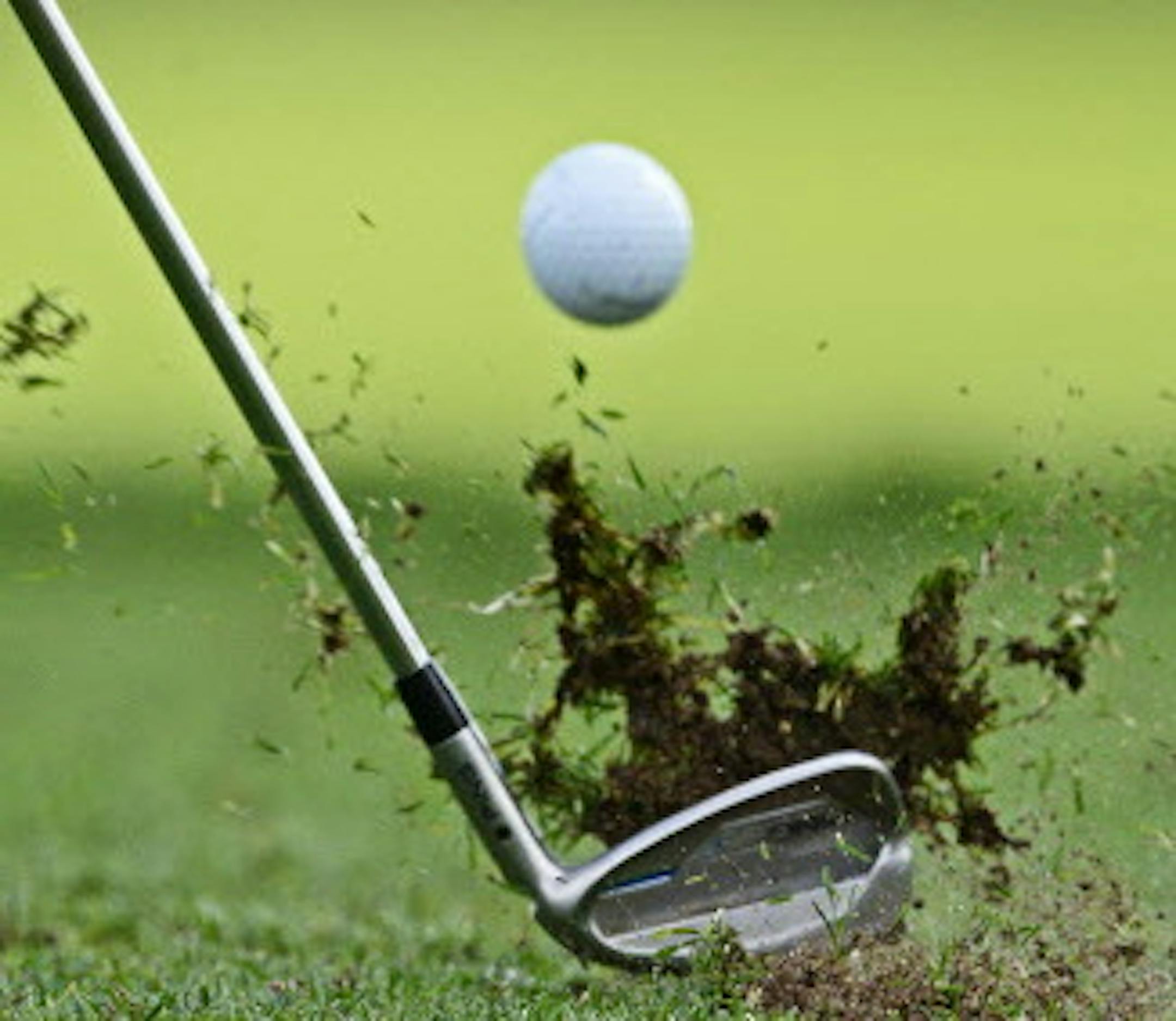 A player hits a ball during warm up prior the fourballs on Day2 at the Solheim Cup golf tournament in St. Leon-Rot, southern Germany, Saturday, Sept. 19, 2015. (AP Photo/Jens Meyer)