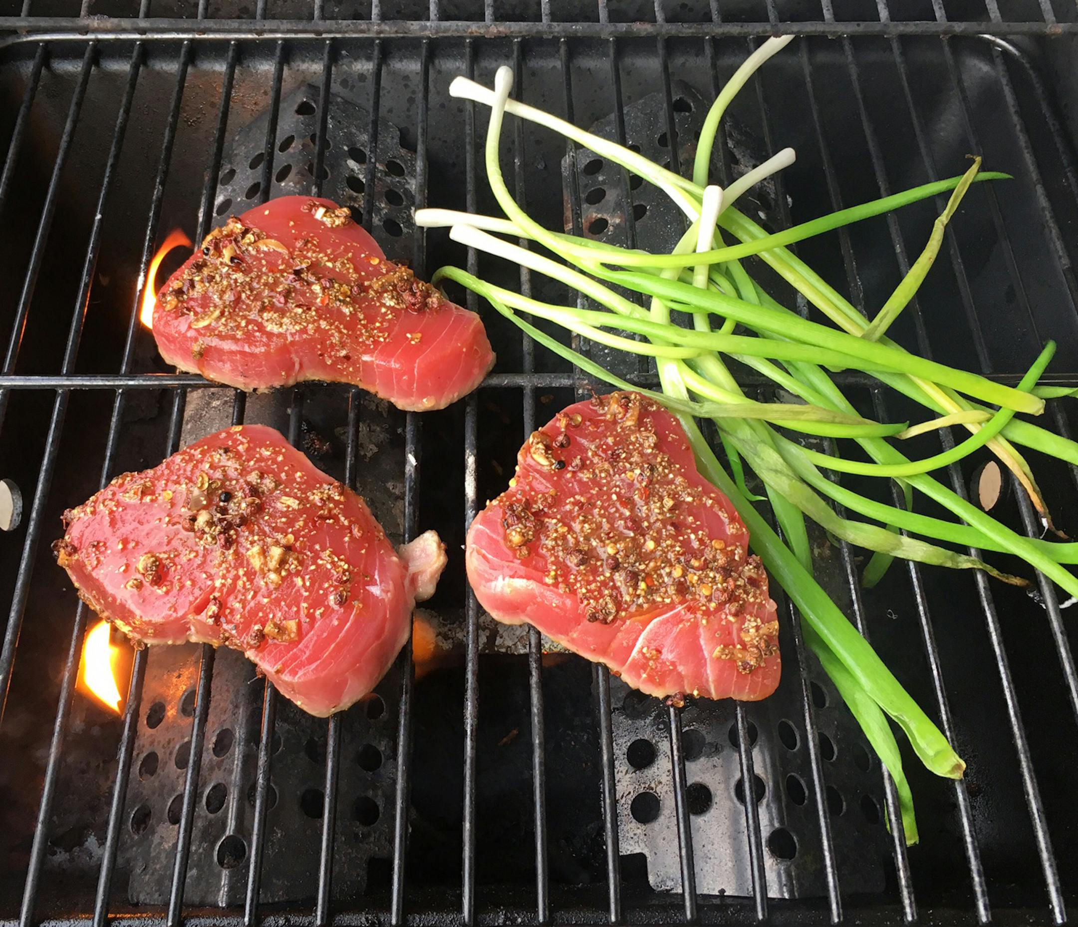 Tuna Pepper Steak With Smashed Green Onion Butter.