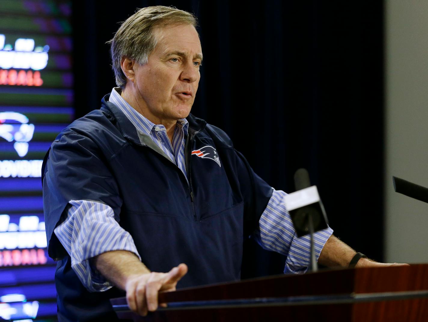 New England Patriots football head coach Bill Belichick speaks at Gillette Stadium Saturday, Jan. 24, 2015, in Foxborough, Mass., where he defended the way his team preps its game balls. (AP Photo/Steven Senne)