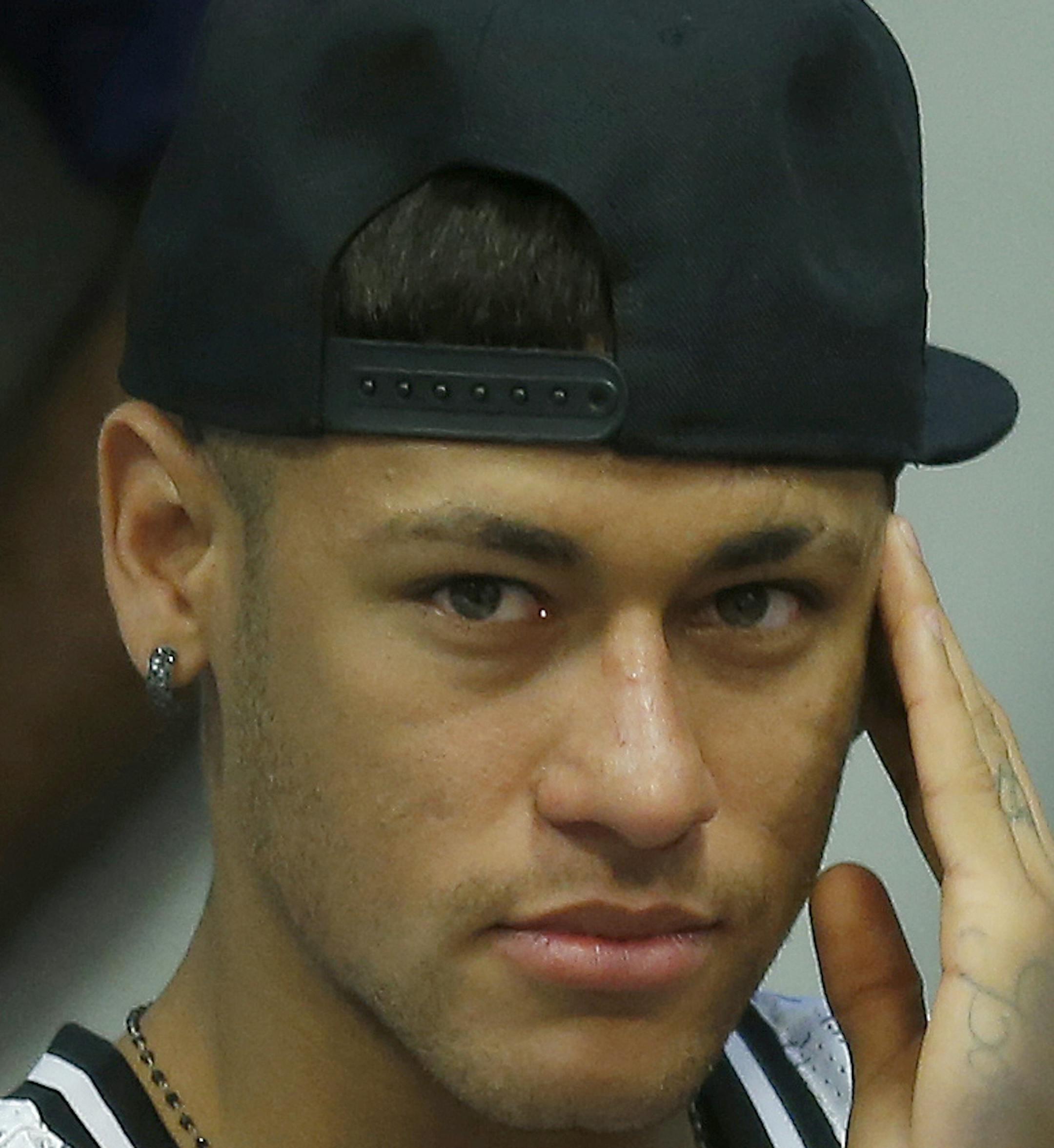 FC Barcelona's Neymar, from Brazil, left, and Lionel Messi, from Argentina, attend the farewell press conference of Barcelona's former player Pedro Rodriguez at the Sports Center FC Barcelona Joan Gamper in San Joan Despi, Spain, Monday, Aug. 24, 2015. Rodriguez was signed by Chelsea and his arrival bolsters Mourinho's attacking options, with the highlighting the Spaniard's versatility by being able to play as a winger or center forward. (AP Photo/Manu Fernandez) ORG XMIT: MIN2015082918373293