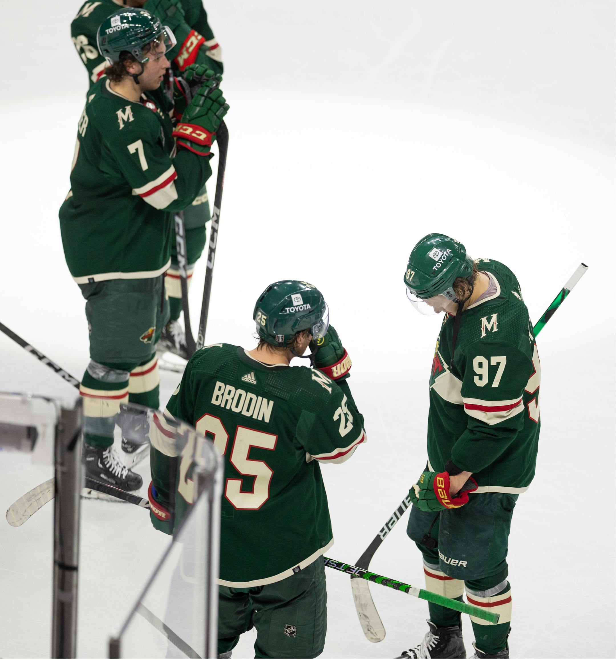 Players, including Minnesota Wild left wing Kirill Kaprizov (97), react to the Wild's elimination from the playoffs after the loss to Dallas.