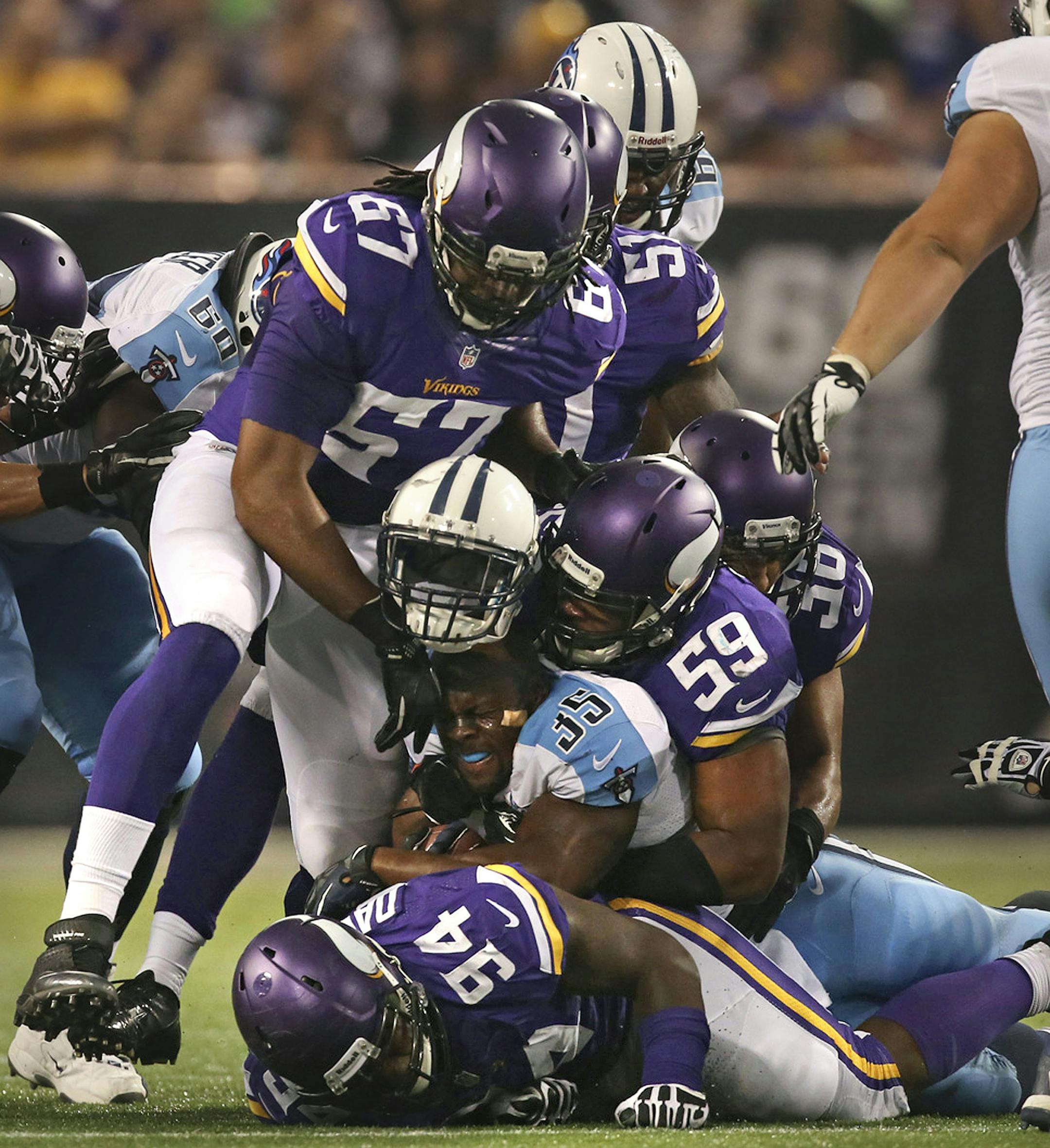 The Titans’ Jalen Parmele had his helmet tore off by Collins Ukwu.