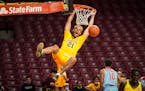 Former Gophers forward Jarvis Omersa (shown dunking against Loyola Marymount in December) announced Sunday he is transferring to St. Thomas.