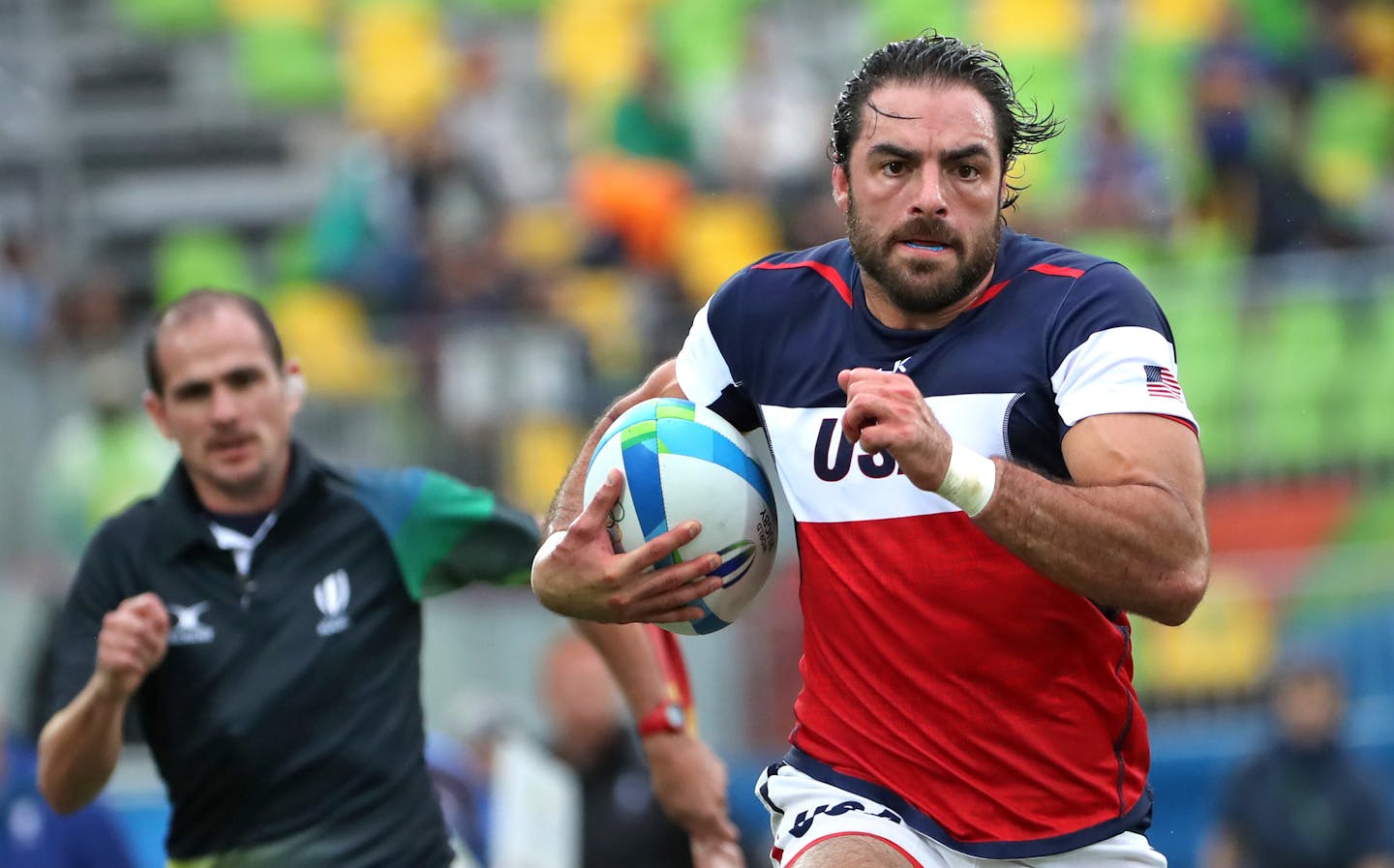 The United States men's rugby sevens team fell to Fiji 24-19 Wednesday afternoon at Deodoro Stadium to end preliminary play with a 1-2 record. Here, NFL Player Nate Ebner scores a try during the match. ] 2016 Summer Olympic Games - Rio Brazil brian.peterson@startribune.com Rio de Janeiro, Brazil - 08/10/2016