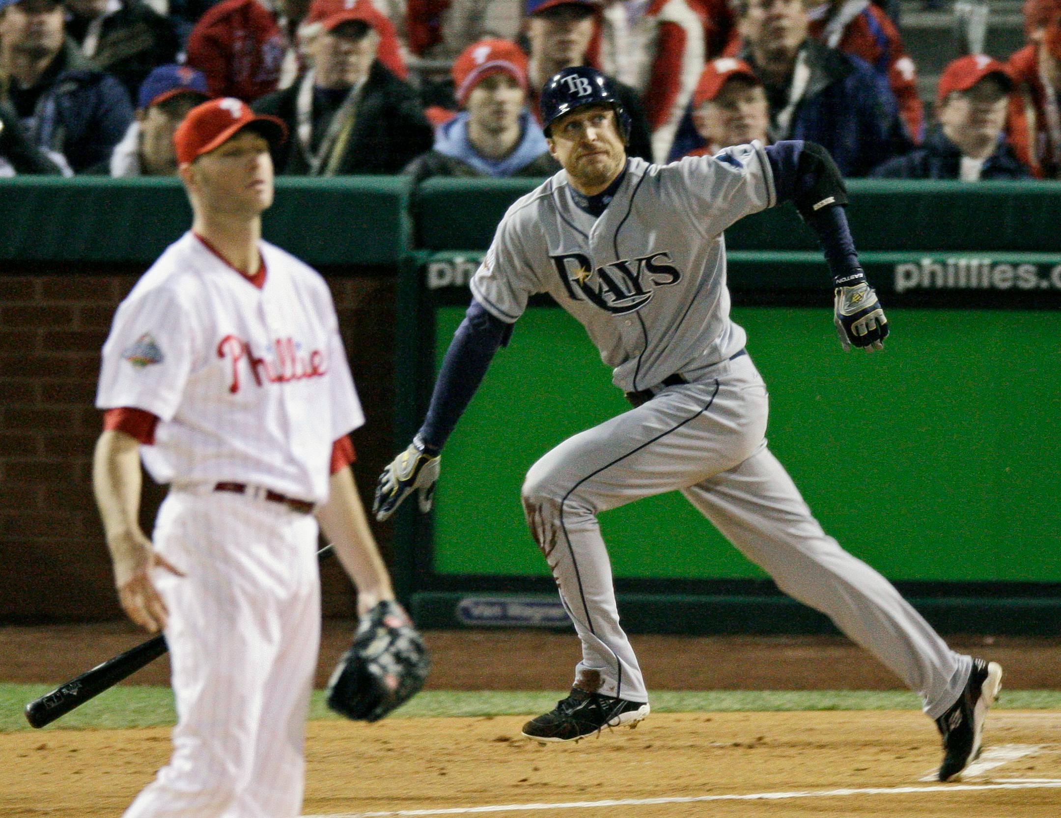 Rocco Baldelli watches his solo home run off Phillies relief pitcher Ryan Madson during the seventh inning of Game 5 of the 2008 World Series