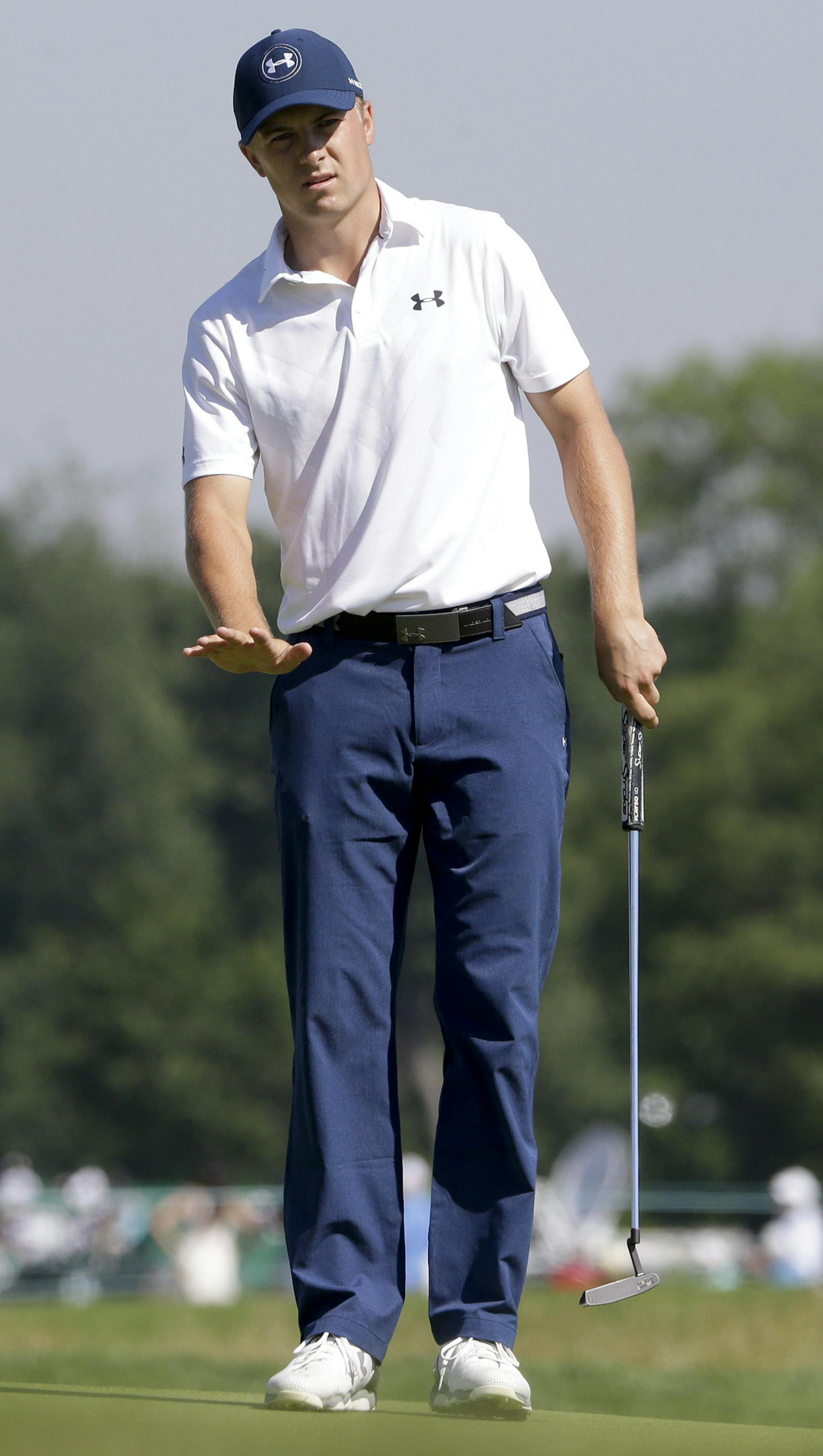 Jordan Spieth watches his putt on the fourth hole during the rain delayed second round of the U.S. Open golf championship at Oakmont Country Club on Saturday, June 18, 2016, in Oakmont, Pa. (AP Photo/Gene J. Puskar)