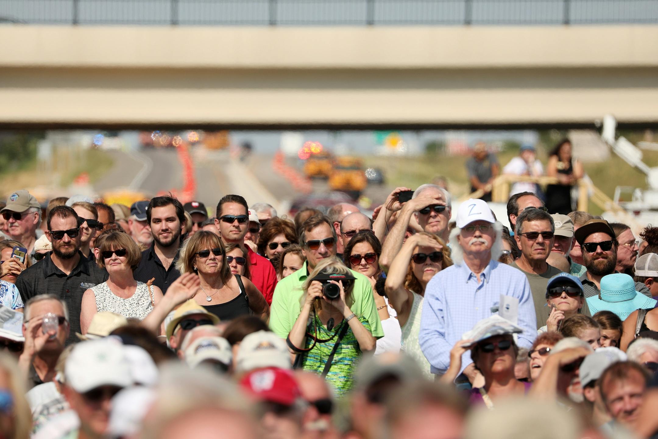 Community members gathered to watch the ribbon-cutting ceremony.