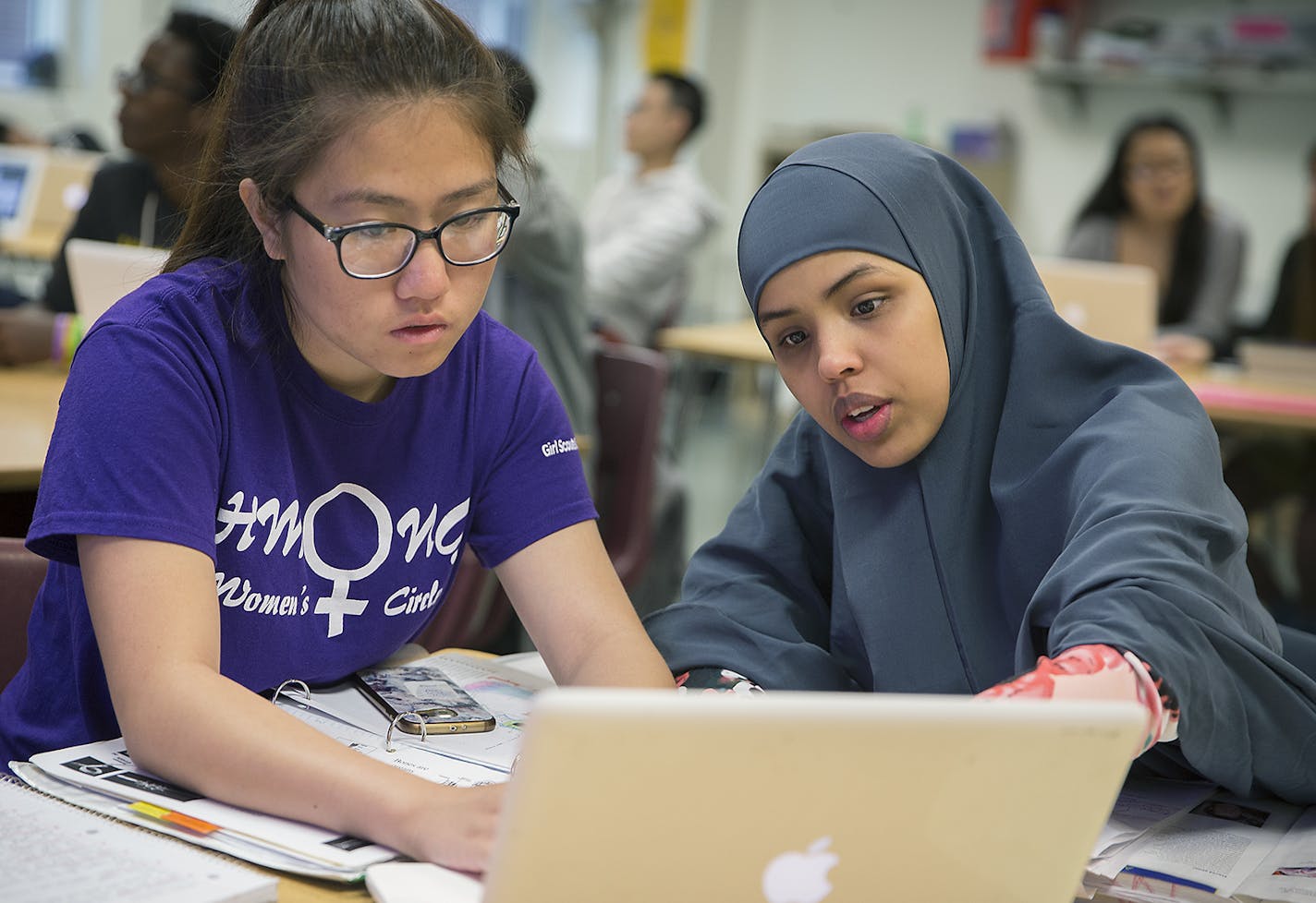 Washington Tech Magnet High School juniors Ann Lee, left, and Nabiha Ali, cq, searched for the phenological events and non-native species that they identified after a hike for an AP biology class, Thursday, June 7 2018 in St. Paul, MN. ] ELIZABETH FLORES &#xef; liz.flores@startribune.com