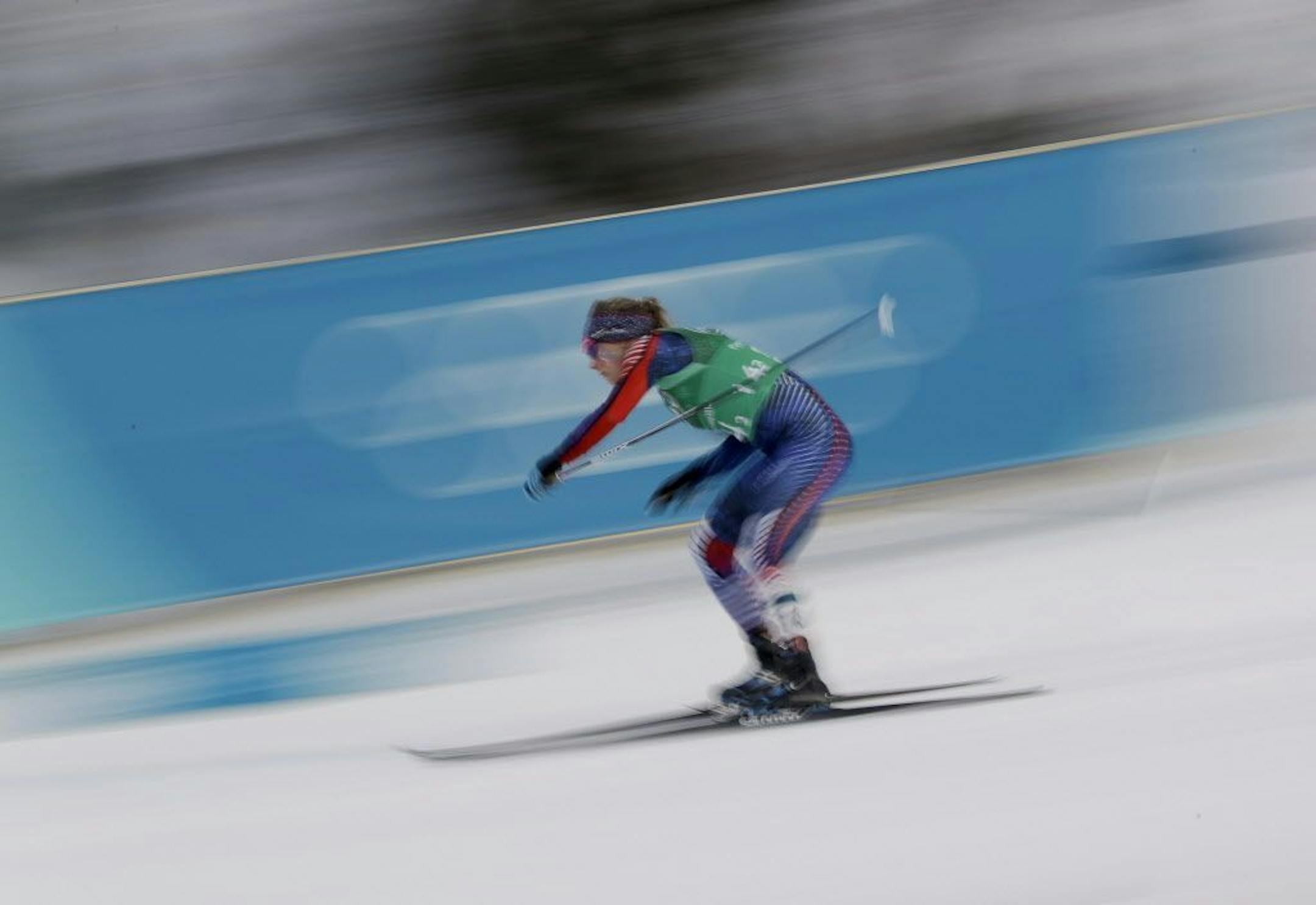 Jessie Diggins, of the United States, competes during women's team sprint freestyle semifinal cross-country skiing competition at the 2018 Winter Olympics.