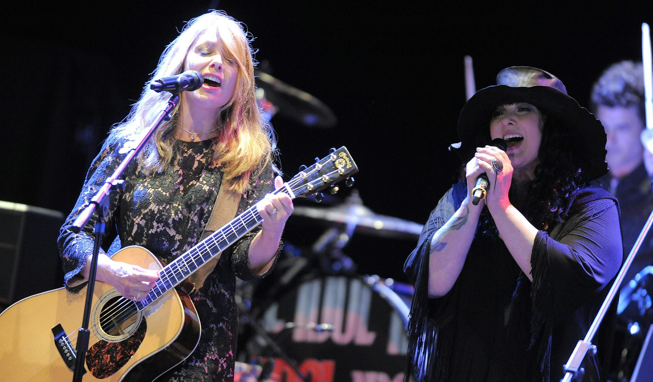 Nancy Wilson (left) and Ann Wilson of Heart perform at the eighth annual MusiCares MAP Fund Benefit Concert on Thursday May 31, 2012 in Los Angeles. All proceeds will benefit the MusiCares MAP Fund, which provides members of the music community access to addiction recovery treatment. (Photo by Jordan Strauss/Invision/AP)