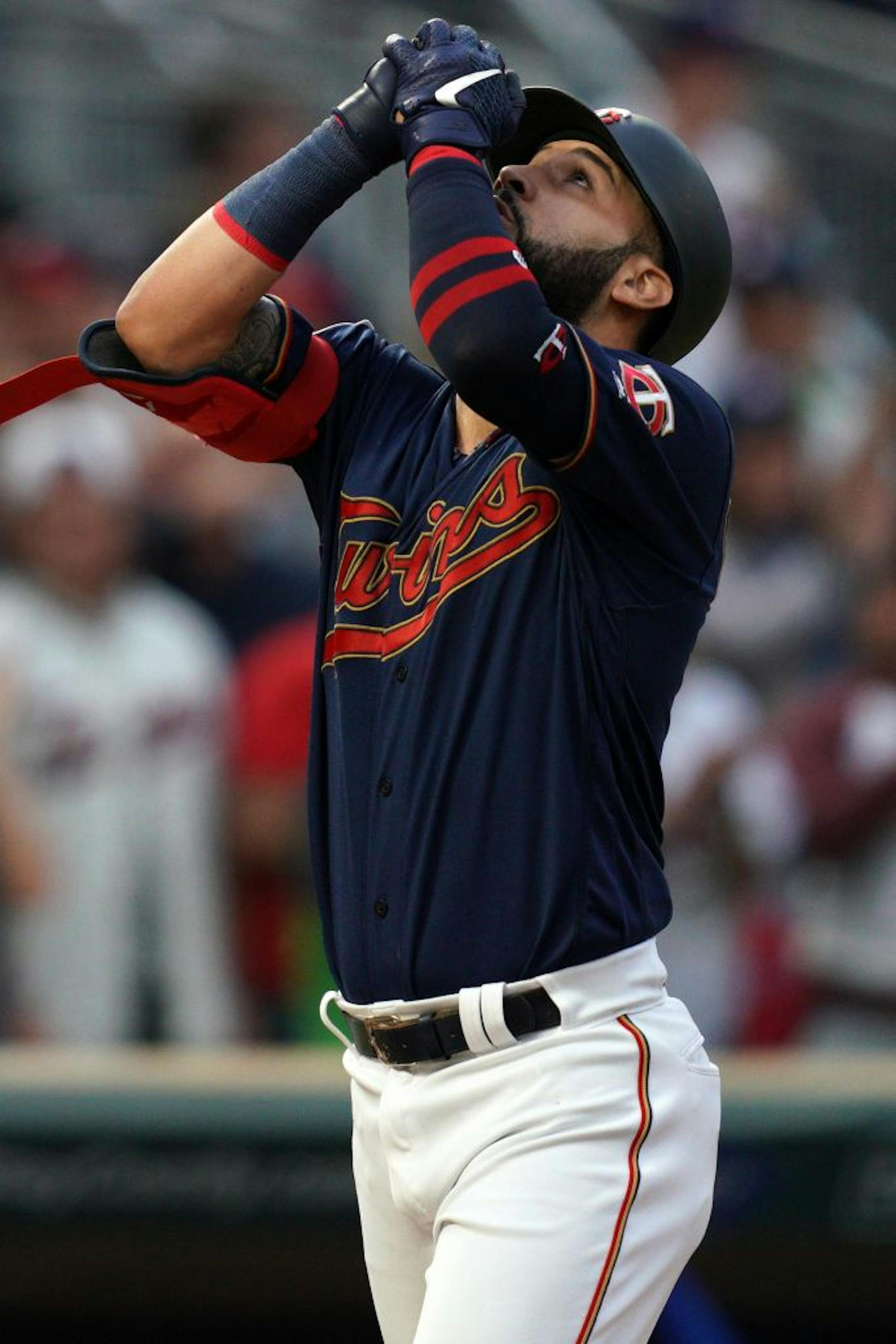 Minnesota Twins third baseman Marwin Gonzalez (9) celebrate as he crossed home plate after hitting a two-run home run in the fifth inning.