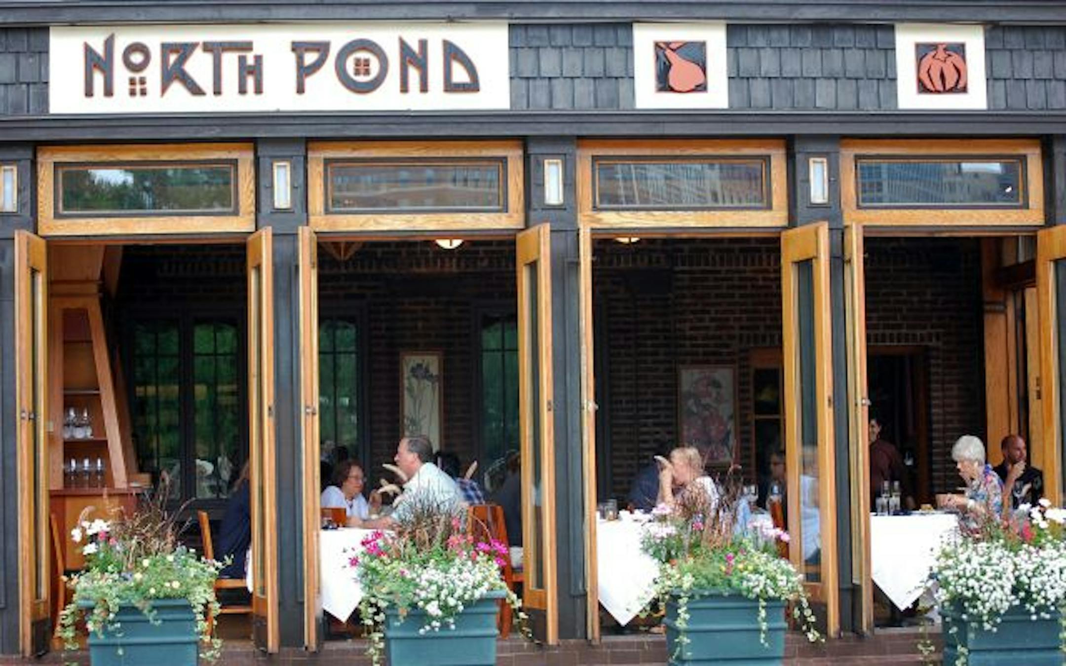 Diners enjoying lunch at North Pond, a one-time ice skating warming shack and now one of Chicago's trendiest eateries in Lincoln Park.