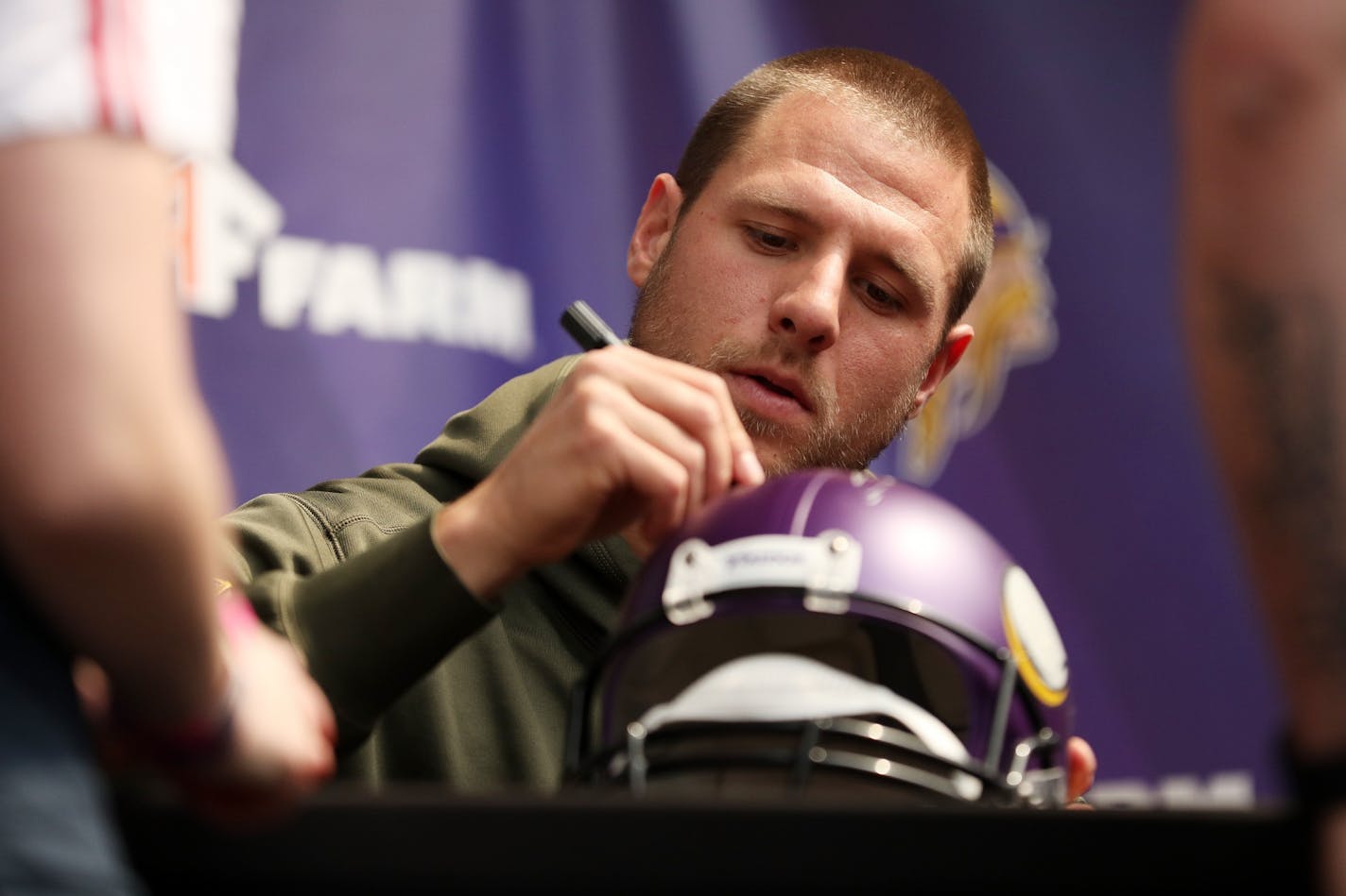 Vikings wide receiver Isaac Fruechte signed autographs at U.S. Bank Stadium during FanFest Saturday.