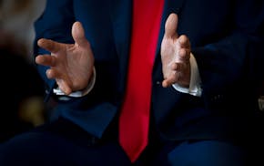 Former President Donald Trump gestures during an interview at Mar-a-Lago, his private club and residence in Palm Beach, Fla., on March 4, 2024.