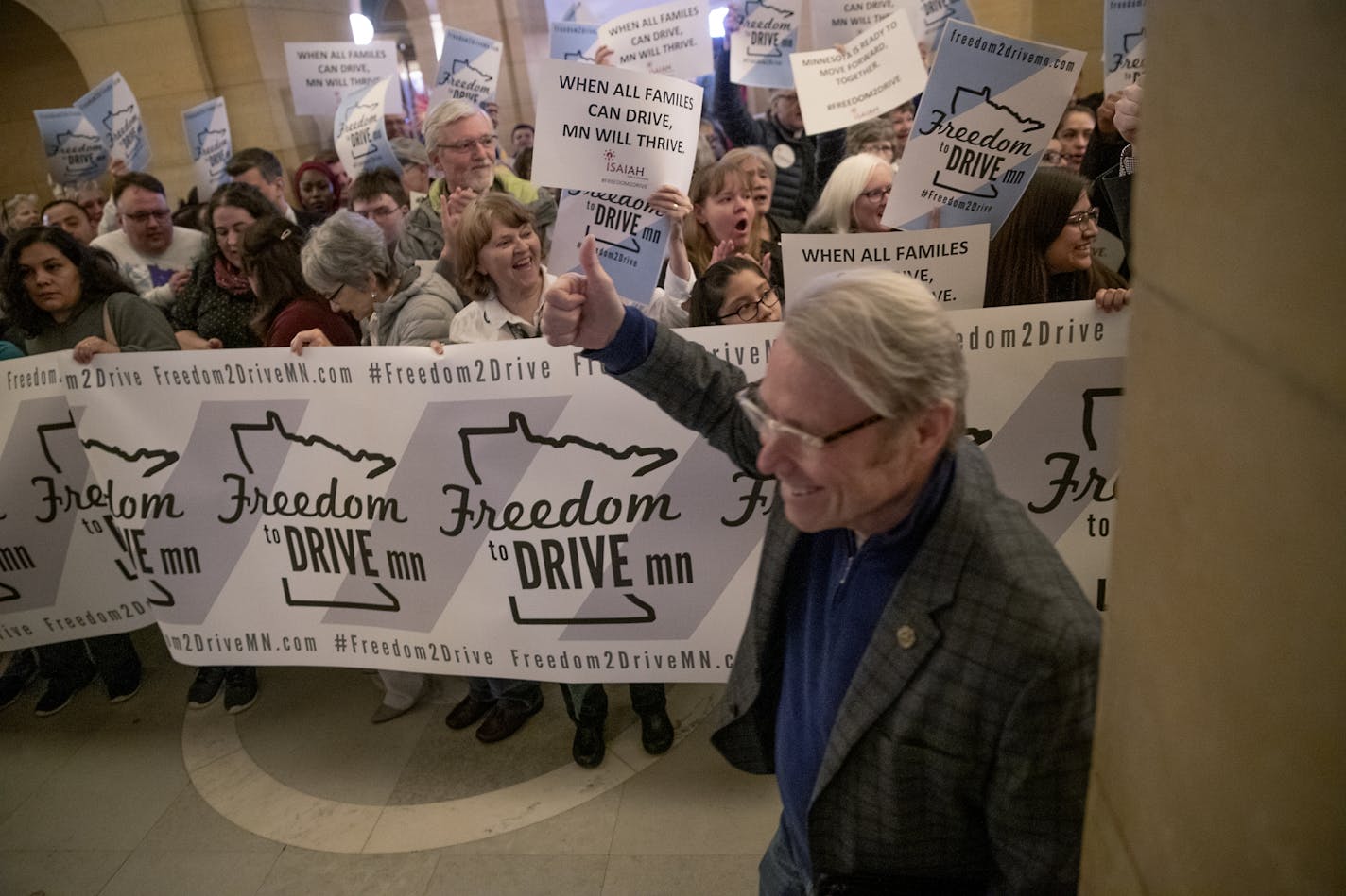 House Representative Raymond Dehn gave a thumbs-up as hundreds of Minnesotans from the Freedom to Drive coalition filled the Capitol Rotunda as the Minnesota House debated on the driver's license for all bill, Friday, April 5, 2019 at the Minnesota State Capitol in St. Paul, MN. The bill, HF1500, would restore the rules back to what they were in 2003 when Gov. Pawlenty changed the law and took away the ability for all Minnesotans to get a license.