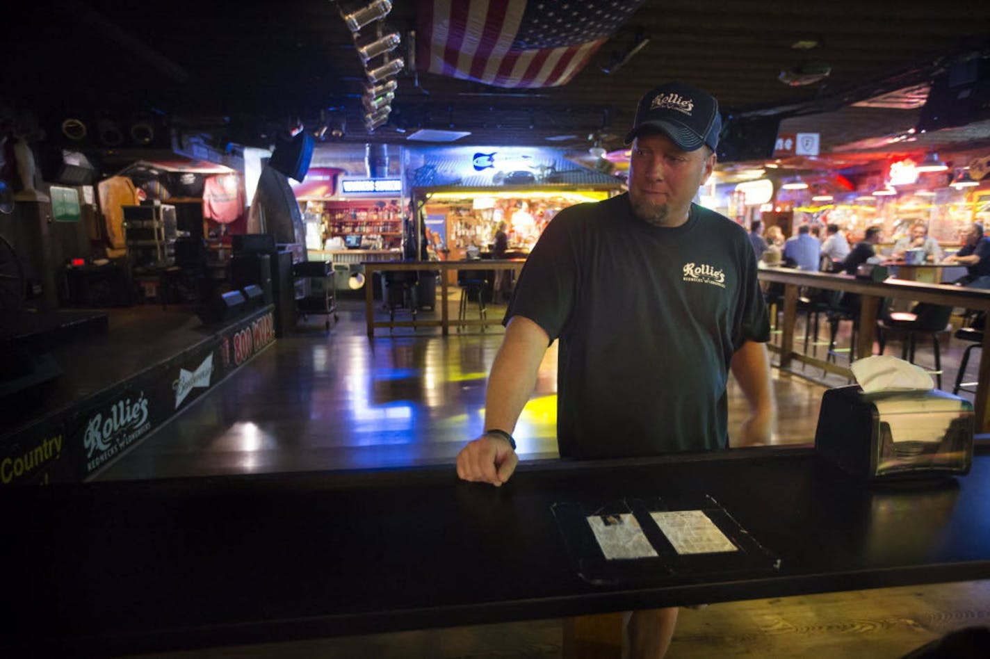 Responding to community criticism, the tourism agency for greater St. Cloud has again delisted Rollie's Rednecks and Longnecks bar in Sauk Rapids from the state's official tourism site.