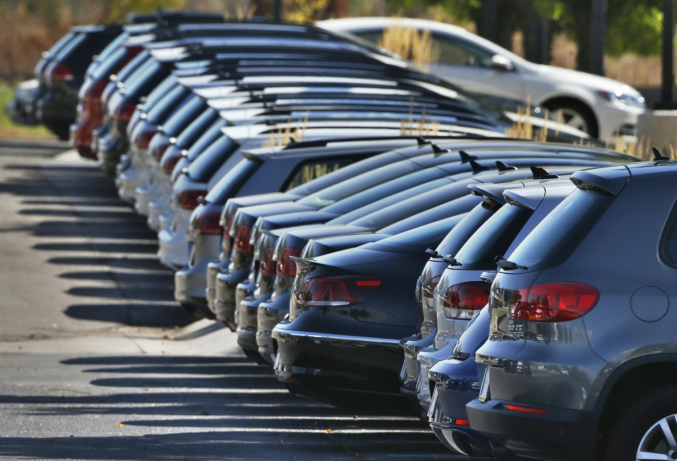 Volkswagen cars for sale are on display on the lot of a VW dealership in Boulder, Colo., Thursday, Sept. 24, 2015. Volkswagen is reeling days after it became public that the German company, which is the world's top-selling carmaker, had rigged diesel emissions to pass U.S. tests. (AP Photo/Brennan Linsley) ORG XMIT: COBL105