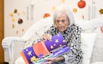 Ruth Knelman, 108, reads "The Owl and the Kitty Cat" to a group of preschoolers at Temple Israel Tuesday morning. ] Aaron Lavinsky &#xa5; aaron.lavins