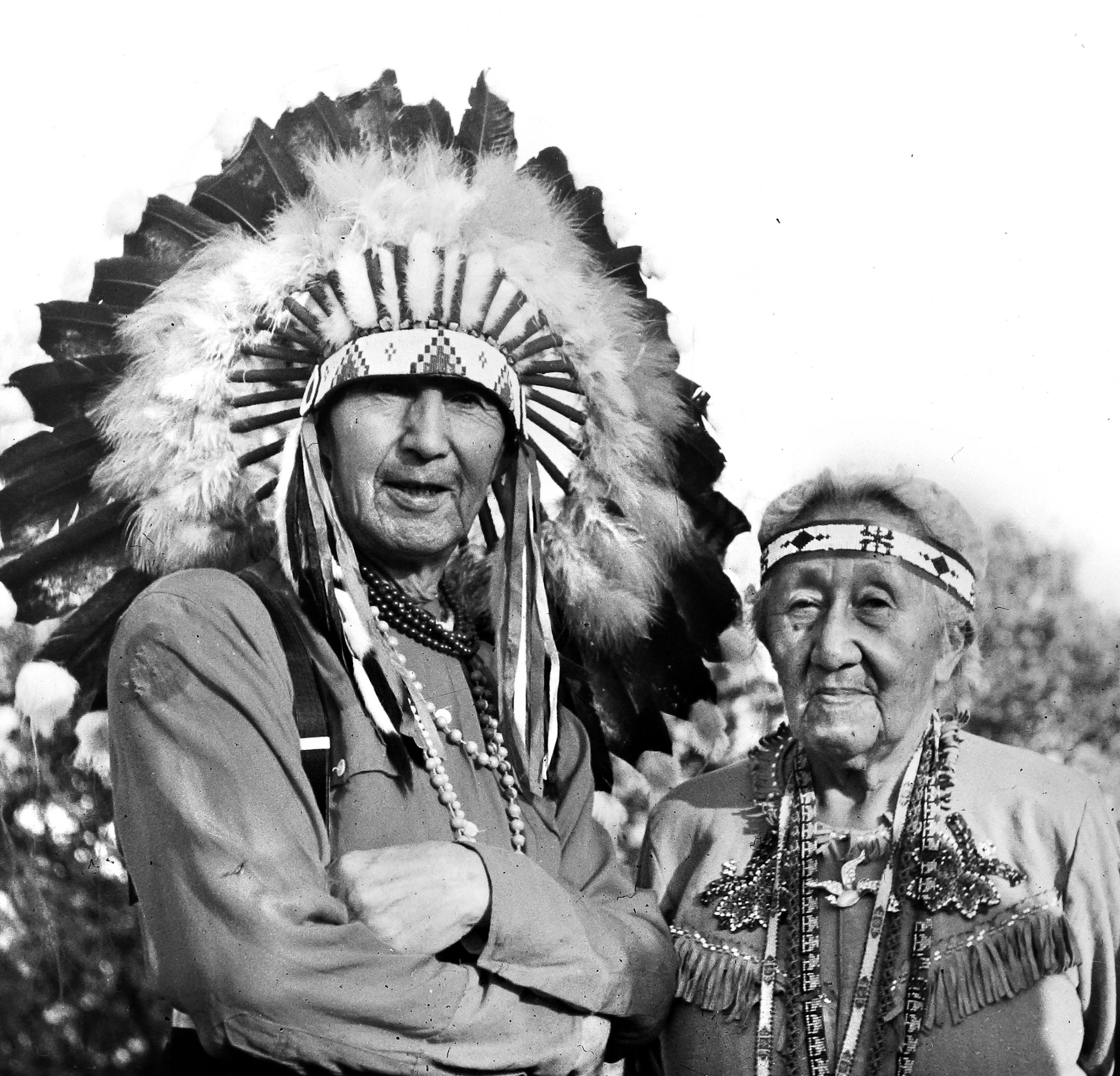 Wearing traditional dress, Scarlet Boy and Morning Star, also known as the Lawrences, attended the South St. Paul reburial ceremony in1958. Morning Star is the granddaughter of Little Crow the fifth.