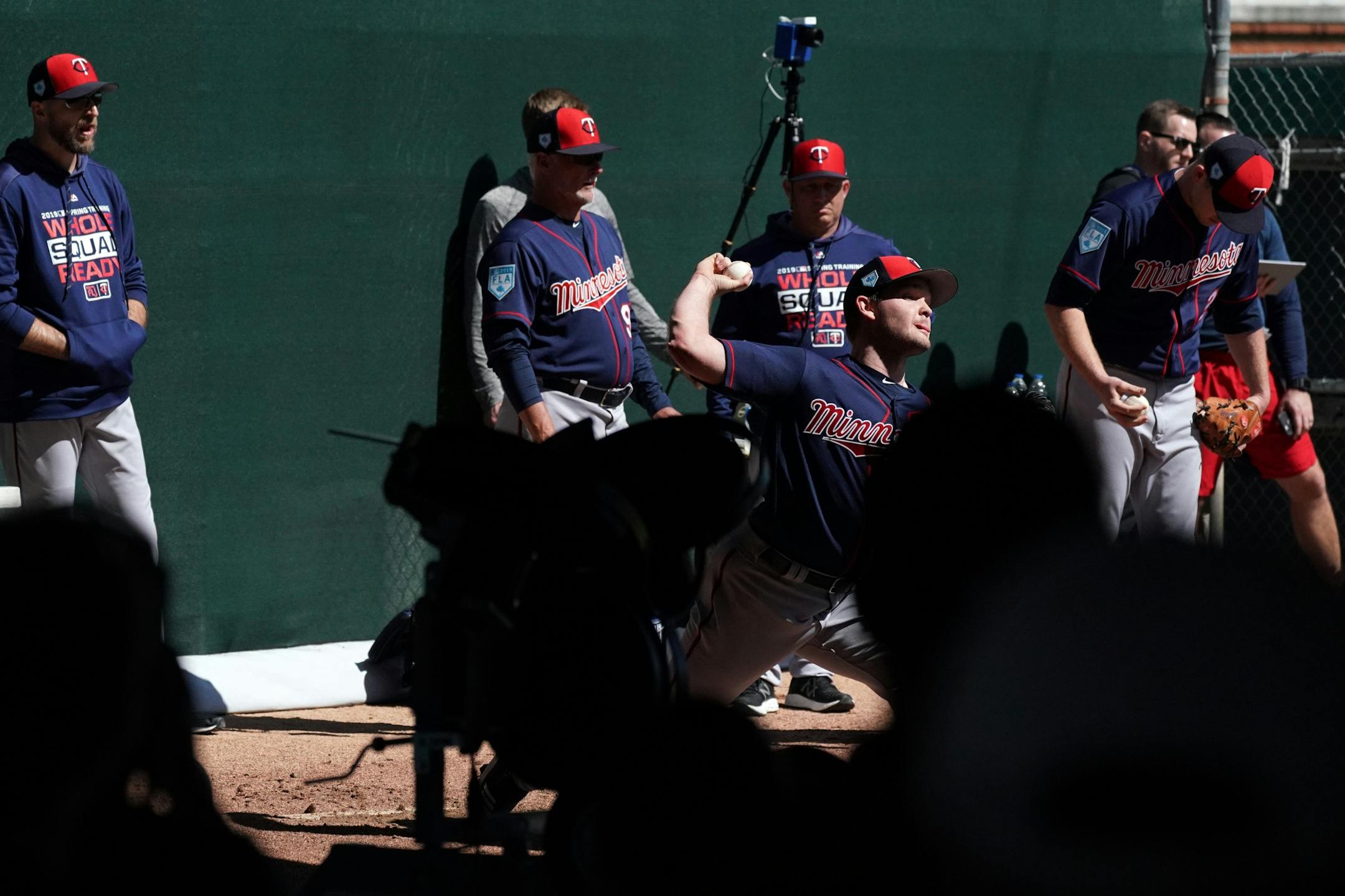 Fans watched from the shade as pitchers worked out in the bullpen at Hammond Stadium Thursday morning.