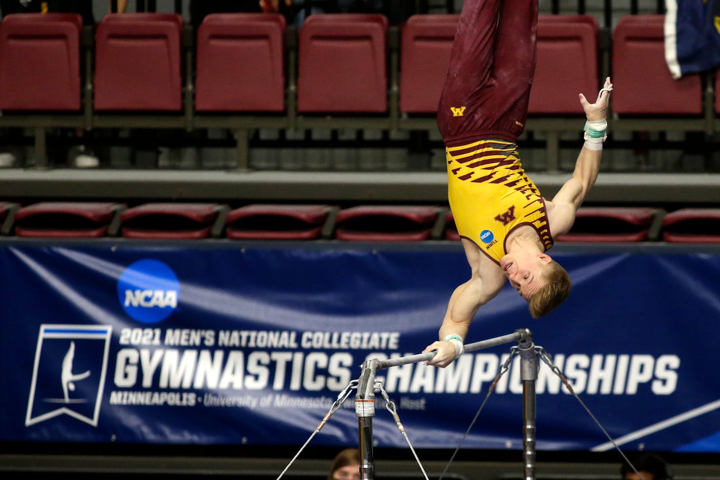 Minnesota's Shane Wiskus competes on the high bar during the NCAA men's gymnastics championships Saturday