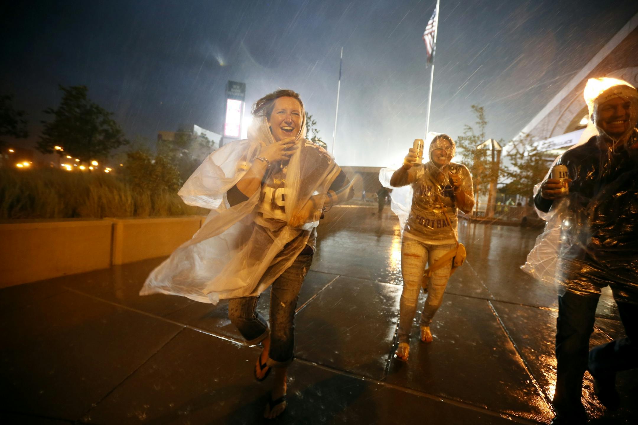 Vikings fans were evacuated in the second quarter from TCF Bank Stadium due to lighting and heavy rains. The Minnesota Vikings hosted the Oakland Raiders at TCF Bank Stadium Saturday August 22, 2015 in Minneapolis, MN.