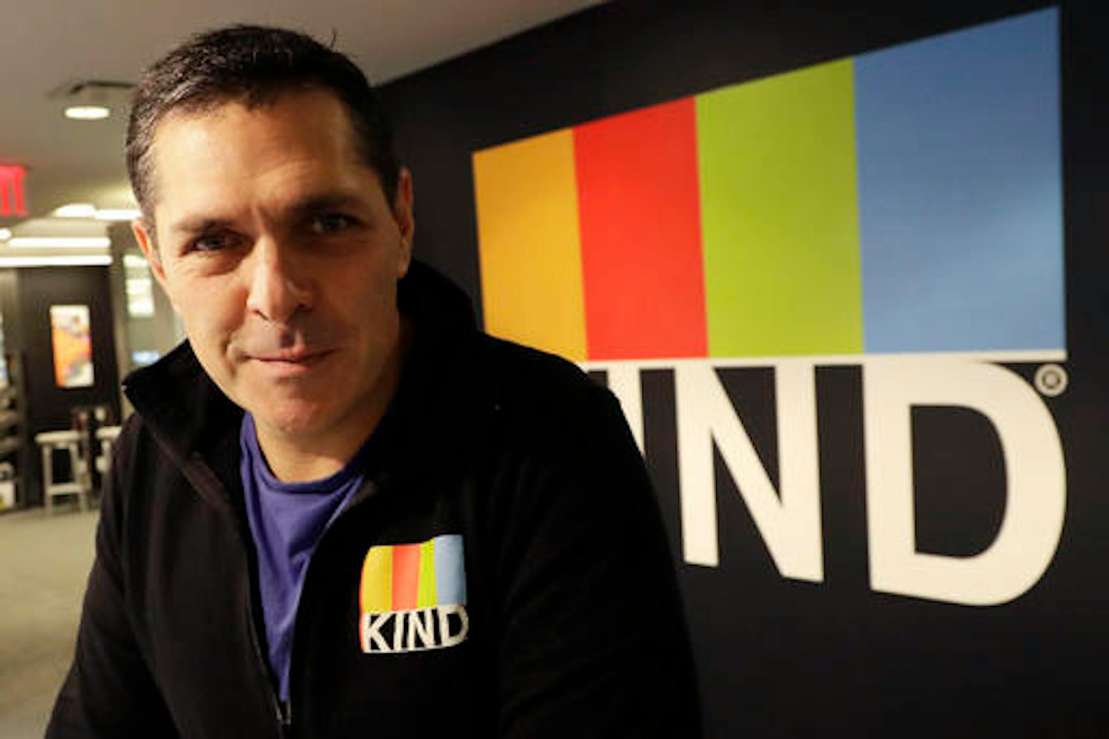 In this Monday, Feb. 6, 2017, photo, Kind CEO Daniel Lubetzky poses for a photo at his office, in New York. Lubetzky is pledging $25 million over the next 10 years to create a nonprofit dedicated to "revealing and countering" the food industry's influence on public health. The move underscores the division between "Big Food" companies and newer players that market themselves as wholesome alternatives aligned with public health. (AP Photo/Mark Lennihan)