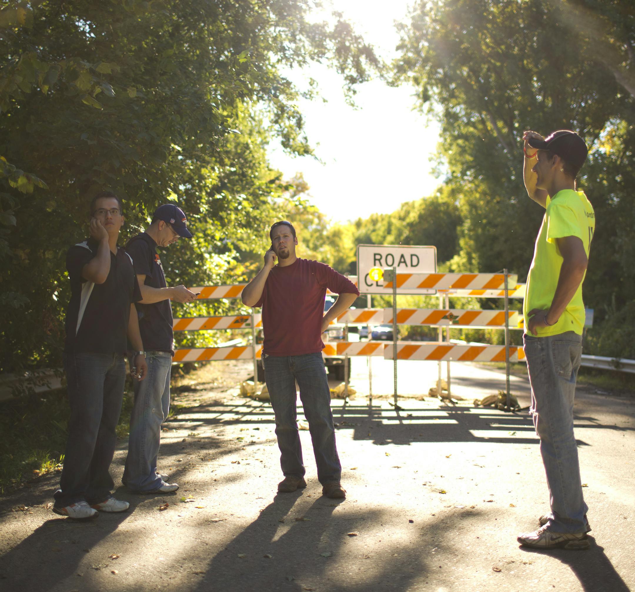 Volunteers, responding to a Facebook appeal, searched for the body of Anarae Schunk in Lilydale Regional Park in St. Paul Sunday afternoon, September 29, 2013. Volunteer searchers checked with other searchers by cell phone before being ferried by Steven Matula, right, in his pickup truck to another location in Lilydale Regional Park Sunday afternoon. Matula, the brother of the Mandy Matula, who has been missing since May, lent his efforts to the seach for Schunk. ] JEFF WHEELER ‚Ä&#x