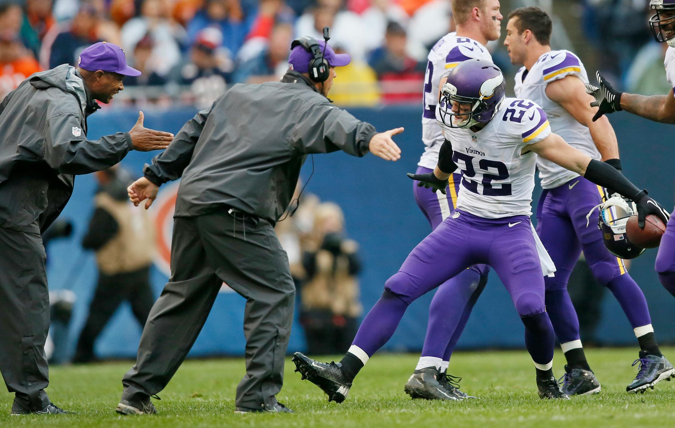 Harrison Smith (22) celebrated his third quarter interception with head coach Leslie Frazier and defensive line coach Jeff Davidson during NFL action between the Chicago Bears and Minnesota Vikings at Soldier Field Sunday September 15, 2013 in Chicago , IL. Chicago beat Minnesota 31-30 ] JERRY HOLT • jerry.holt@startribune.com