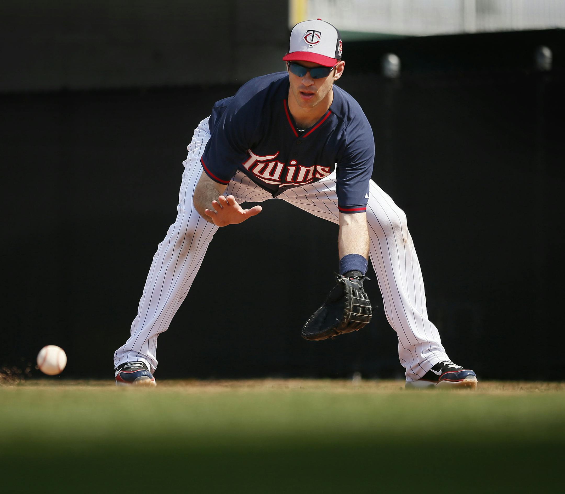 Joe Mauer worked out at first base at Lee County Sports complex on March 1, 2014, in Florida.