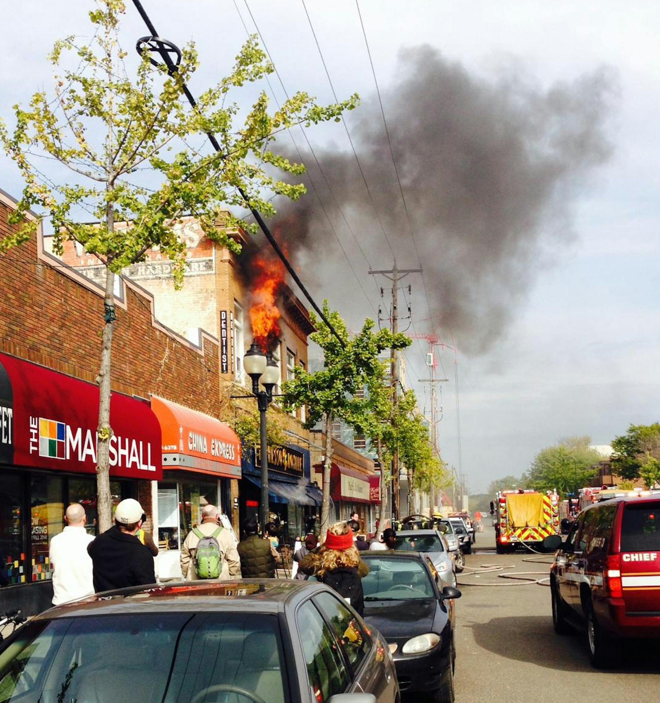 Apartments caught fire Friday above a Dinkytown coffee shope during the lunch period near the University of Minnesota. Several fire trucks responded to the flames above Espresso Royale, 411 14th Av. SE., shortly after noon. The blaze was under control within an hour or so, said Stephen Wood, who works at a nearby pizza place. There was no immediate word on anyone being injured. Wood, who said he used to live in one of the five apartments, said other nearby businesses, including the well-known Al