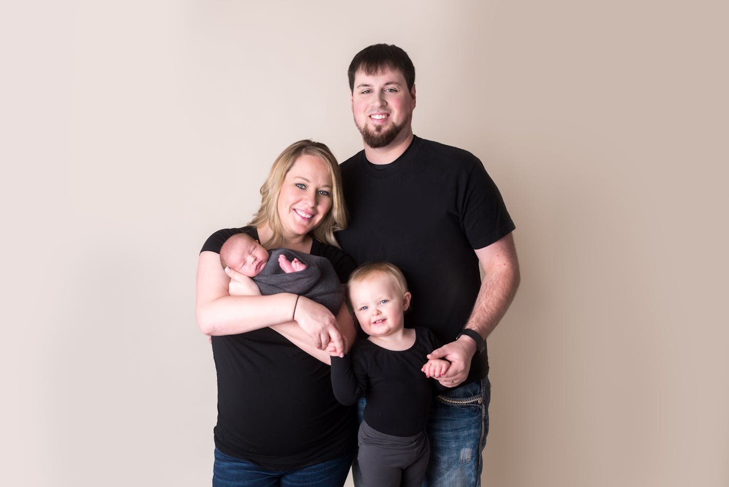 Carlie and Billy Berg finished their accounting finals at the hospital the night their son, Bryar, was born in December. Daughter Gracie is 2. Both parents returned to school through a pilot project at Riverland Community College.