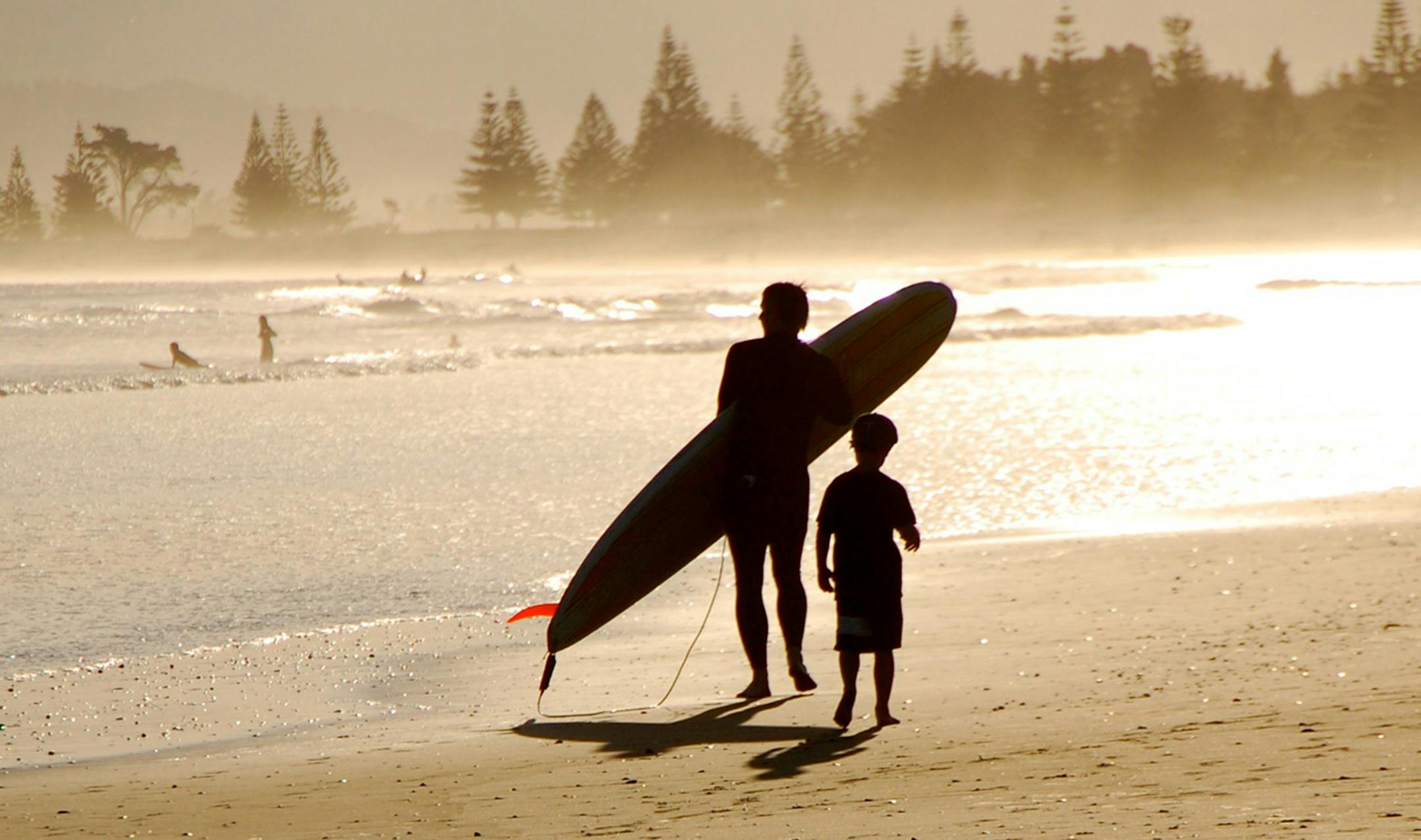 Kelly Adams, Special to the Star Tribune Time for a surfing lesson for Brett Adams and his son, Liam. Kelly Adams of Stillwater says this photo was taken when the family lived in Gisborne, New Zealand.And it was her husband who was actually getting the lesson.[focus061916