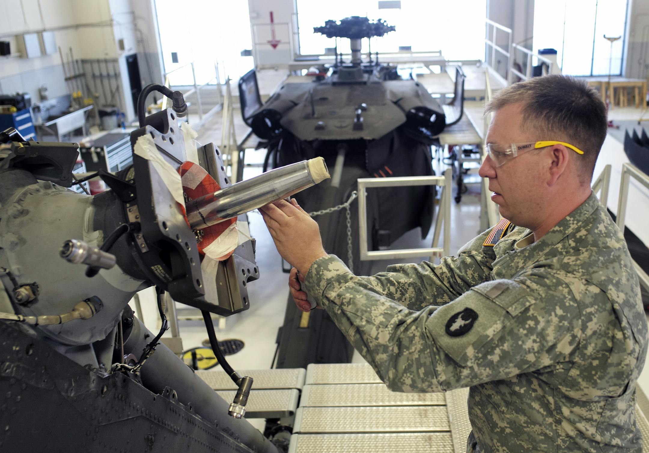 At the Army Aviation at Holman Field, Sgt. Sean Blum worked on the rear rotor of a Blackhawk helicopter which was undergoing scheduled maintenance. ]rtsong-taatarii@startribune.com