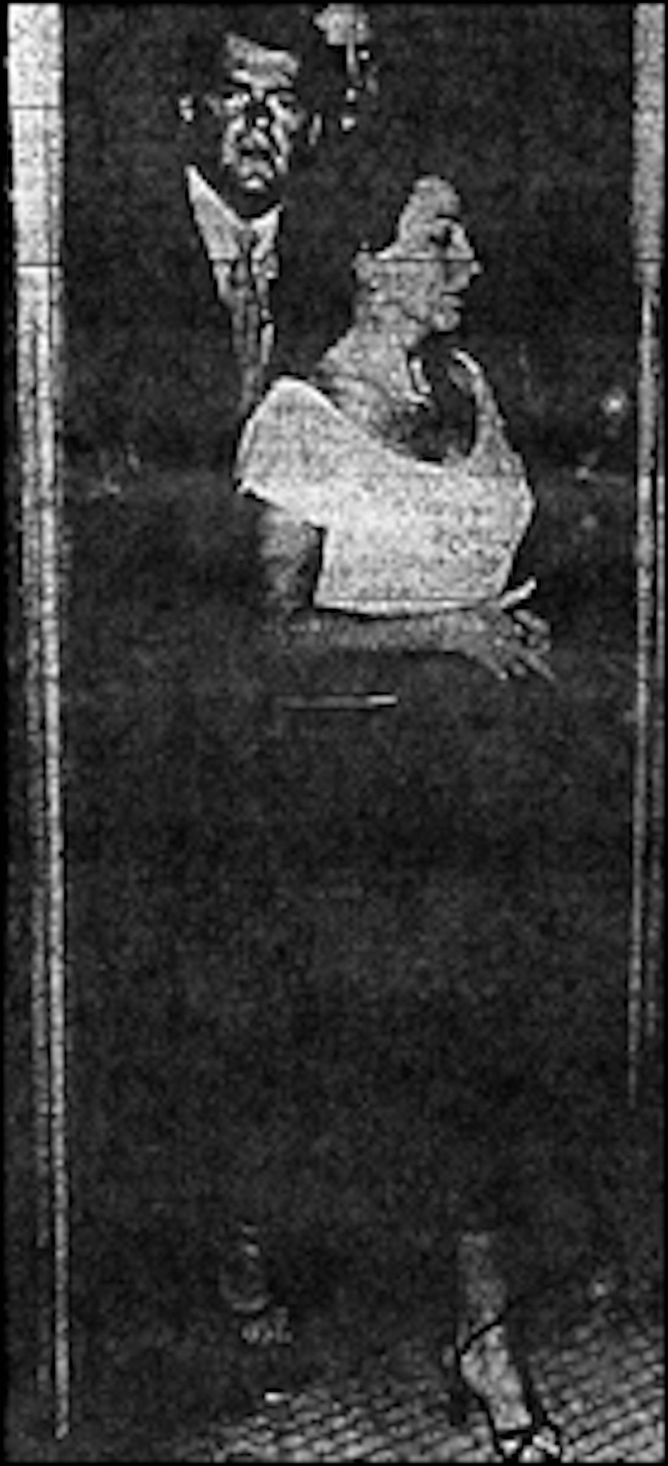 May 1953: Stripper struts from bar to jail