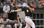 Chicago White Sox's Yolmer Sanchez watches his three-run home run during the fourth inning of game one of a baseball double header against the Minneso