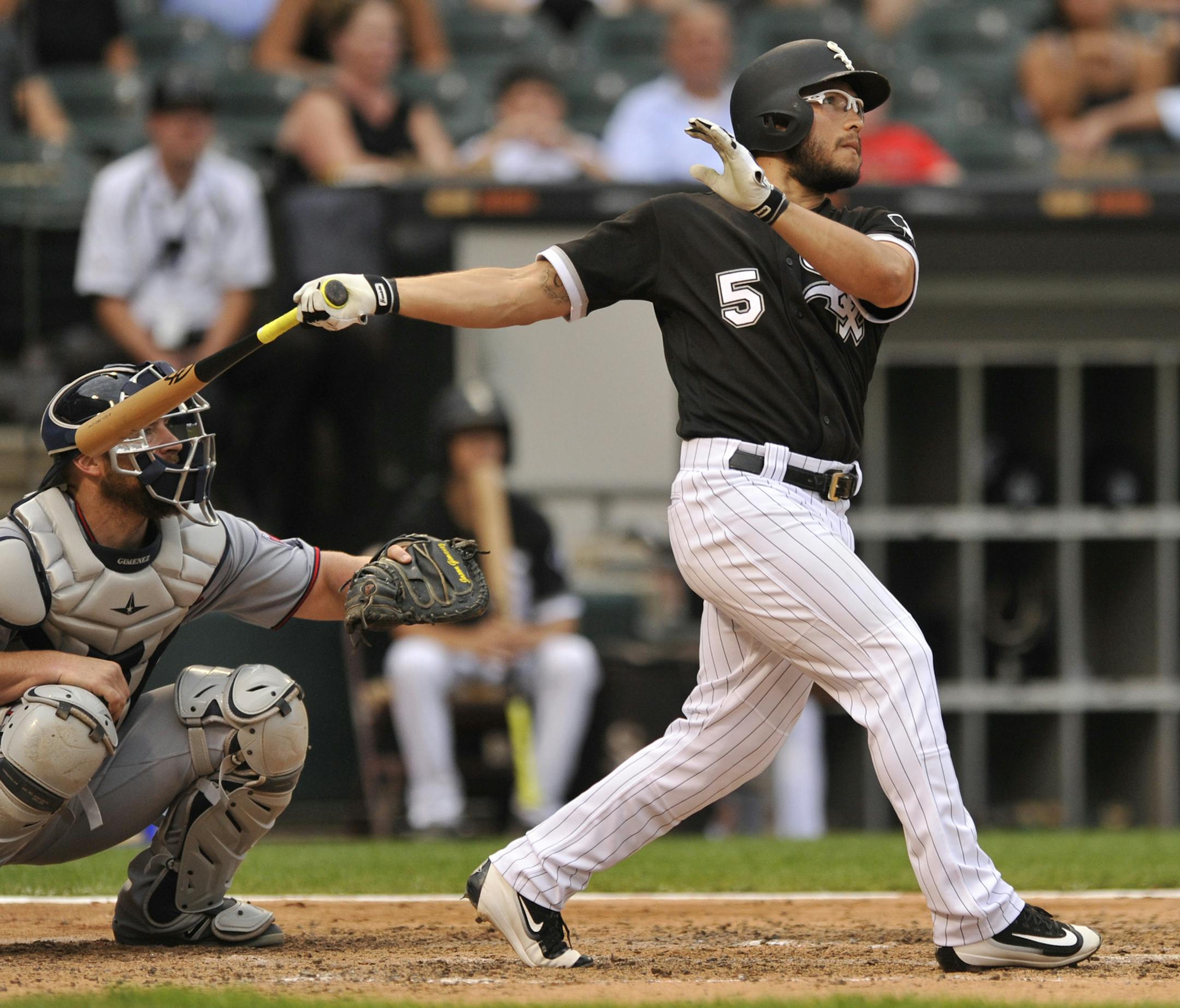 Chicago White Sox's Yolmer Sanchez watches his three-run home run during the fourth inning of game one of a baseball double header against the Minnesota Twins Monday, Aug. 21, 2017, in Chicago. (AP Photo/Paul Beaty)