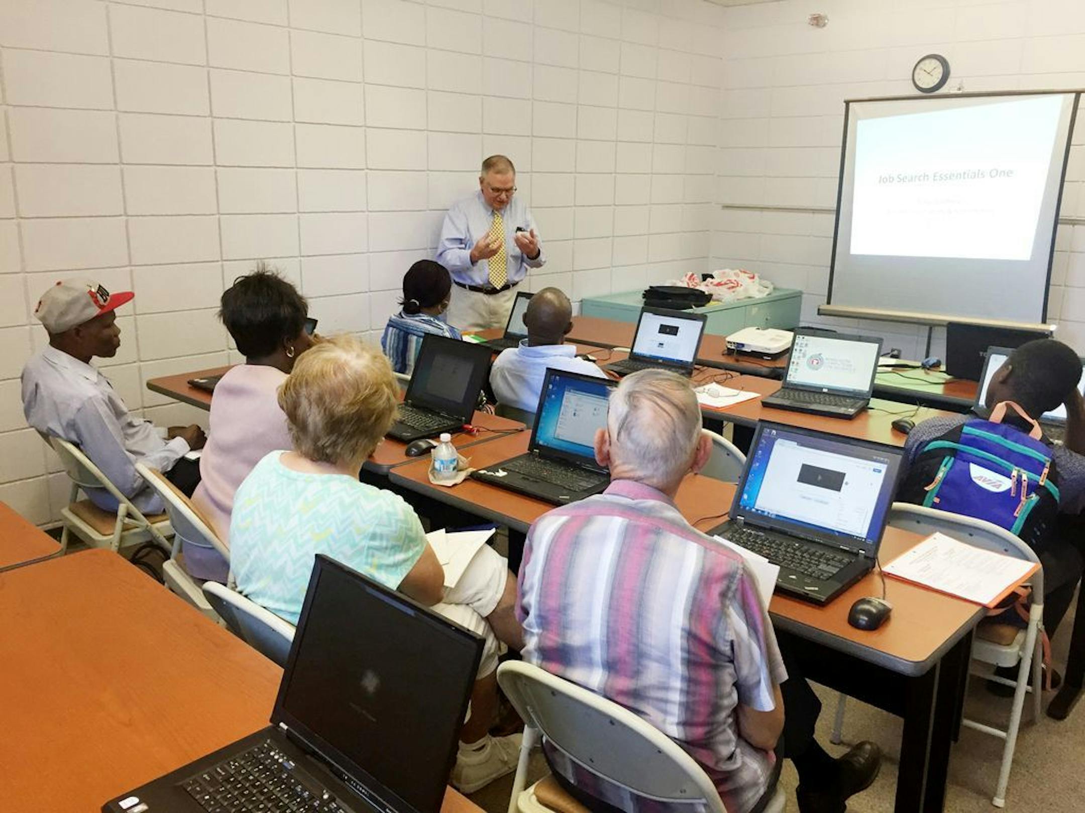 Tracy Godfrey leads a computer class through the WAFCS at Brooklyn United Methodist Church.